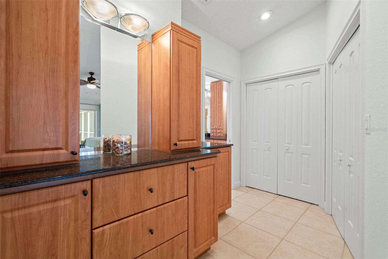 Leads into primary ensuite bathroom.