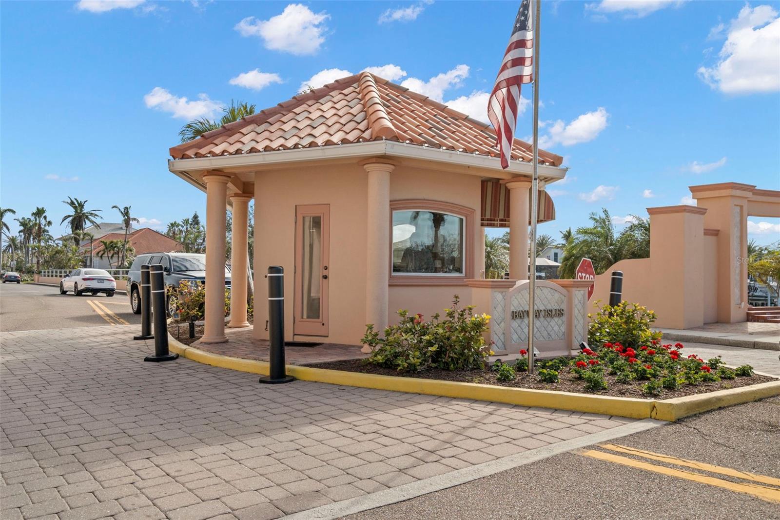 Guard-gated community of Bayway Isles, known for its premier homes and 24-hour security.