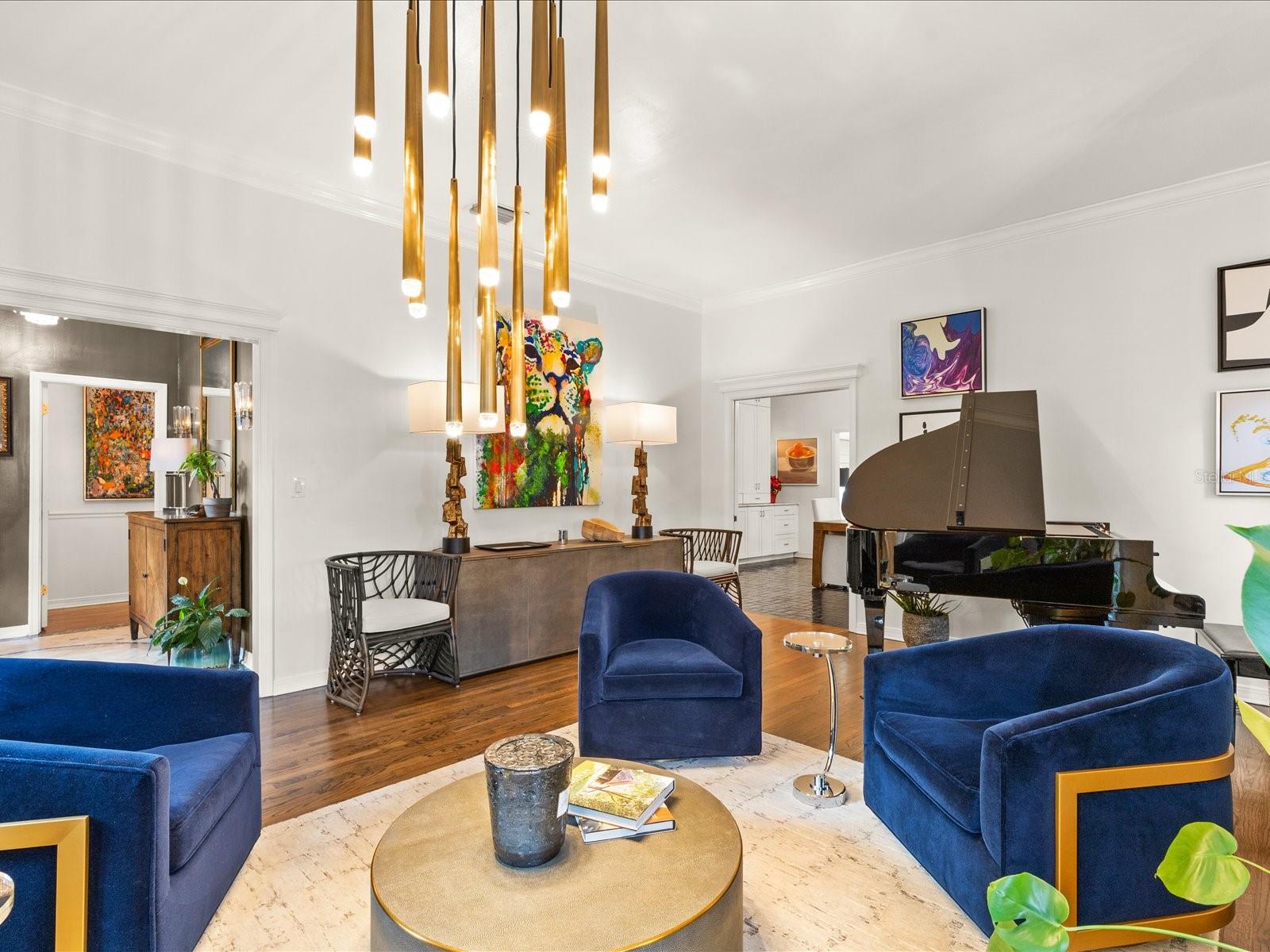 Front Living Room.  High Ceilings with floor to ceiling windows, wood floors.