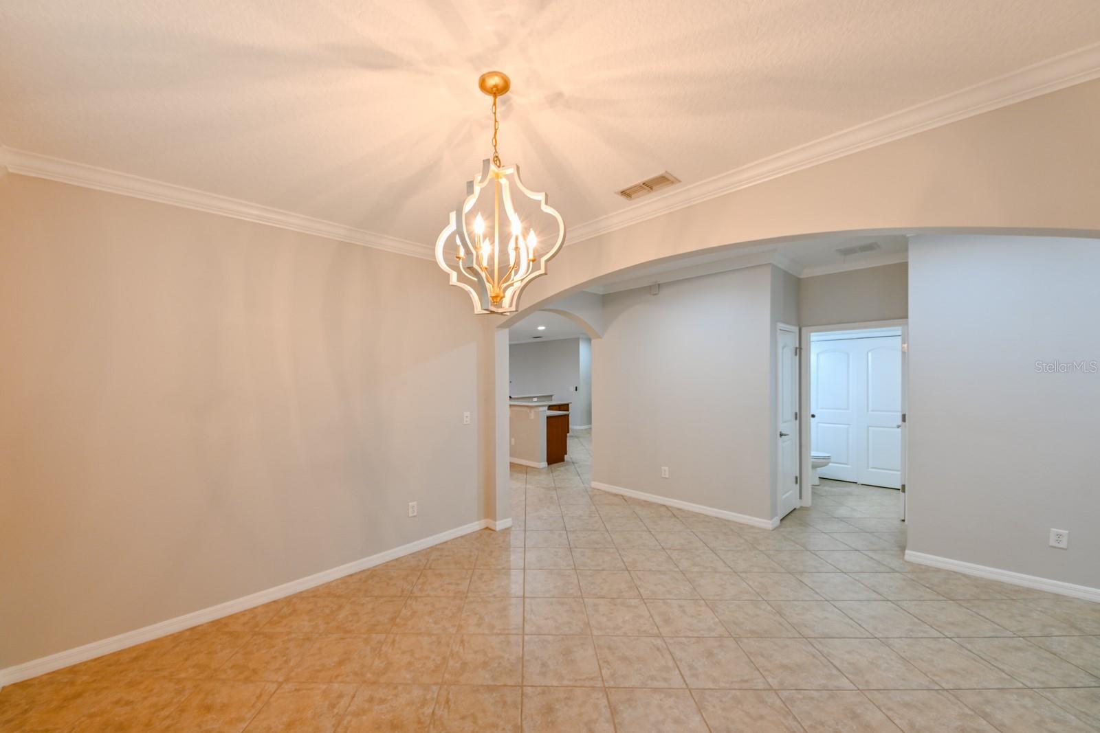 Open Formal Dining Room at Front of Home