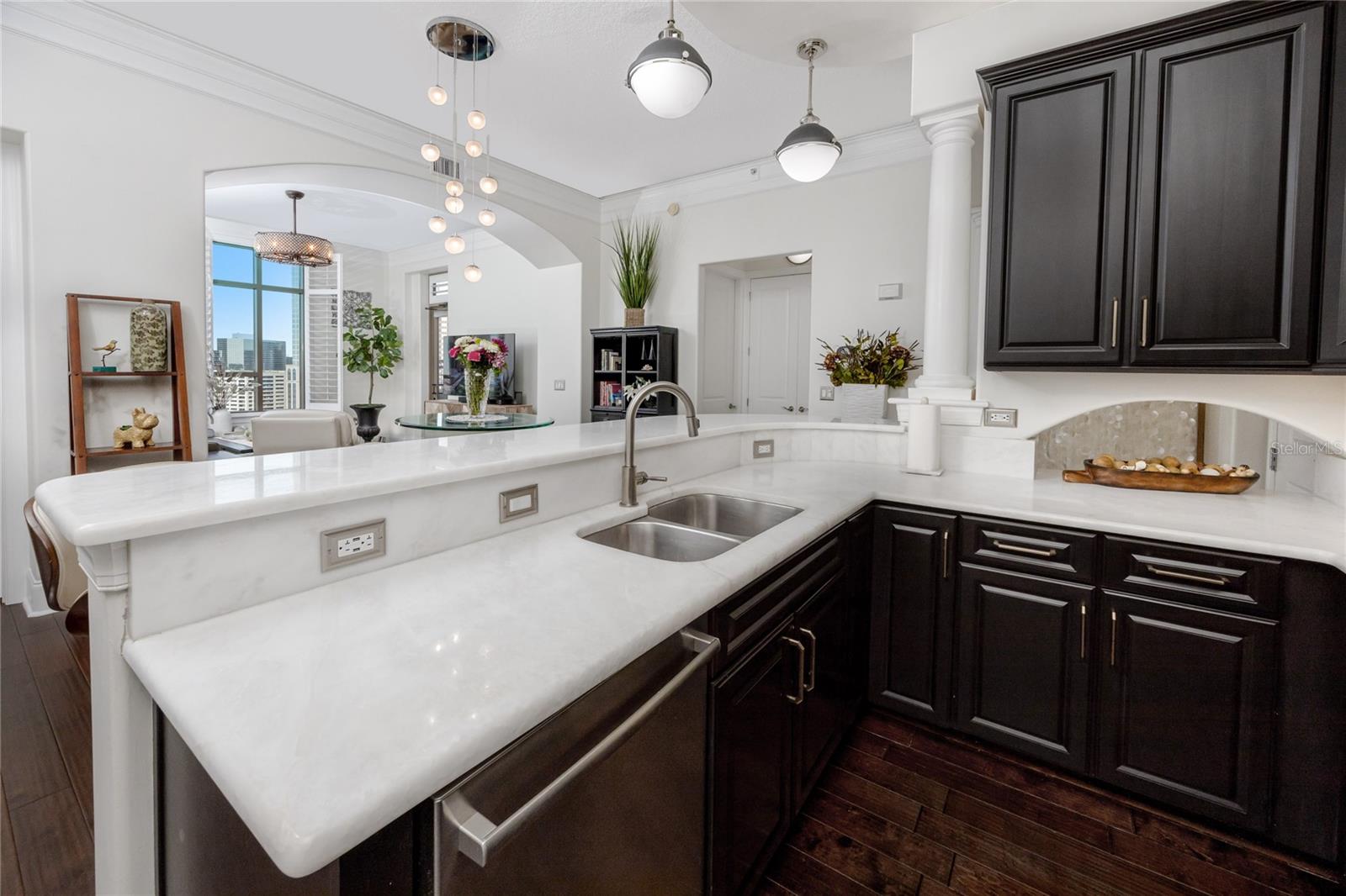 Sleek marble countertops with exquisite cabinetry