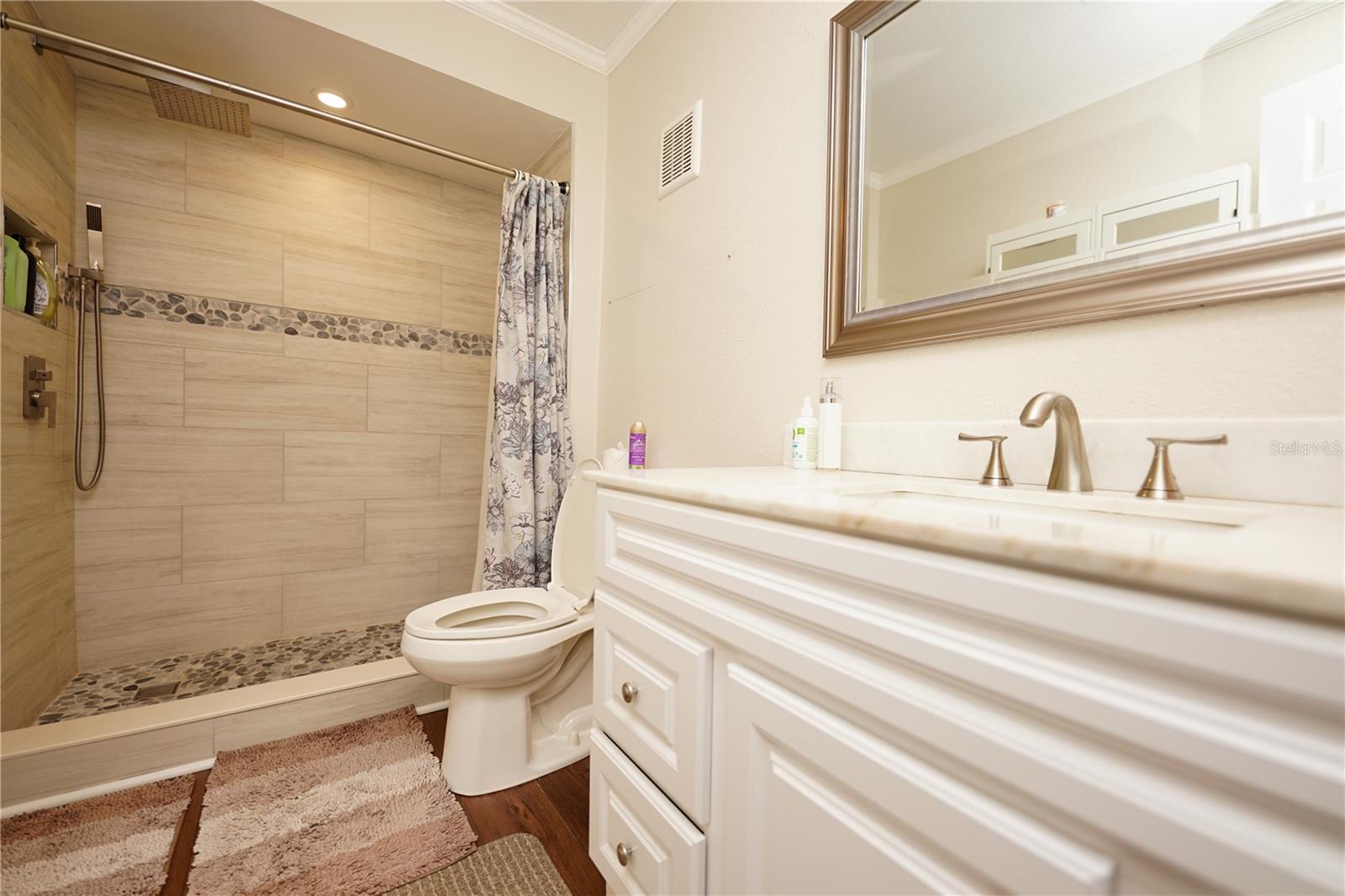 Beautifully remodeled bathroom upstairs