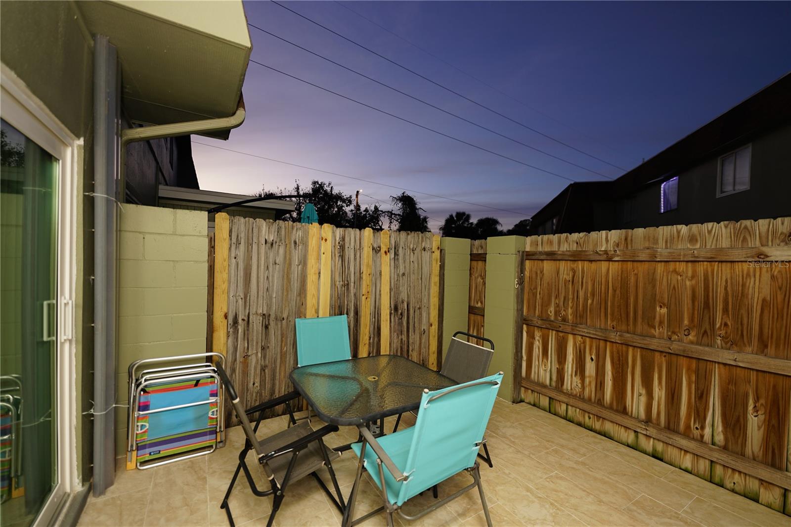 Open fenced patio in the back.