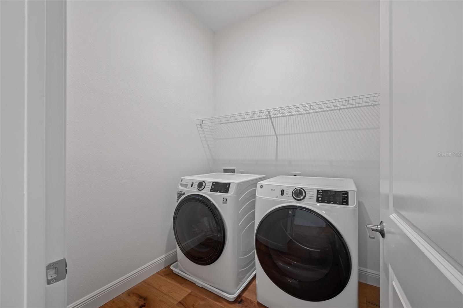 Laundry Room with full-size washer and dryer