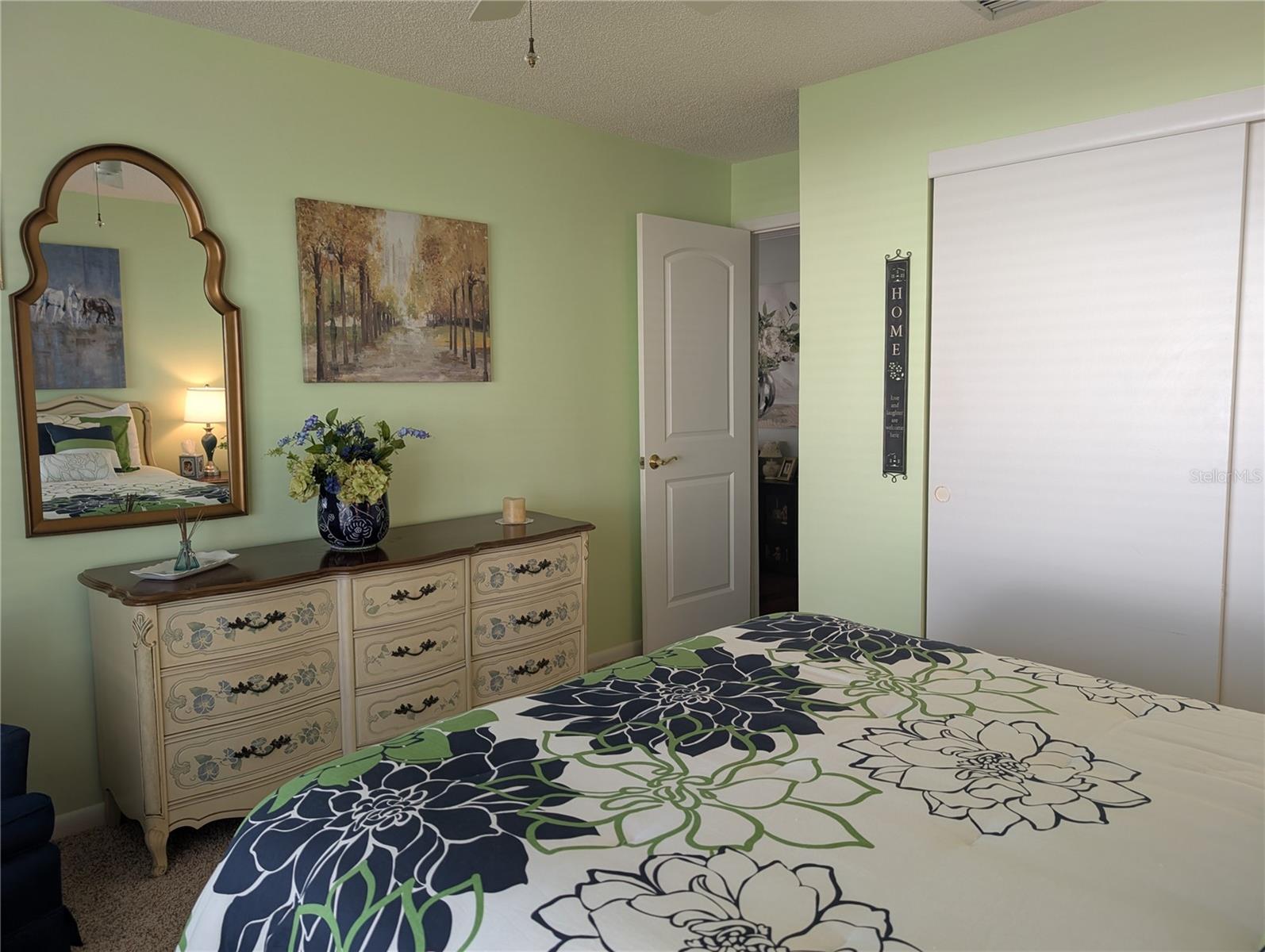 View of closet and new interior door to living area.