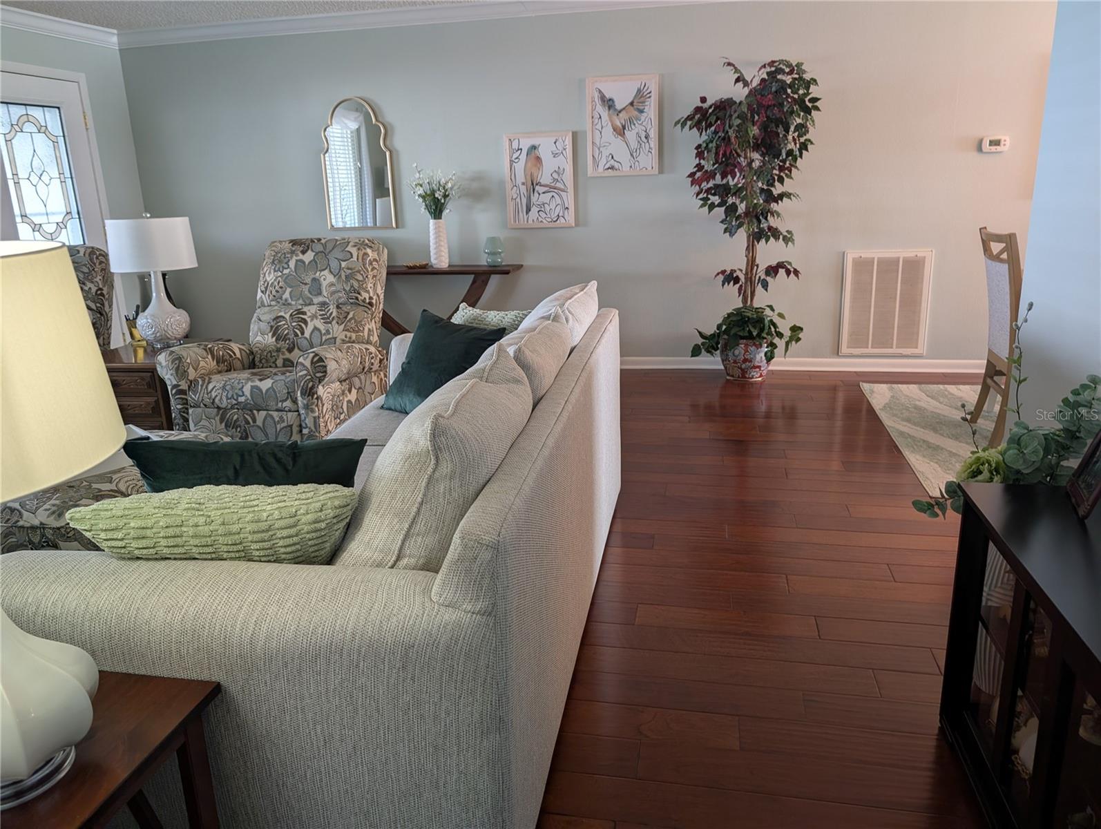 View from guest bedroom into living room.  Dining room is to the right.