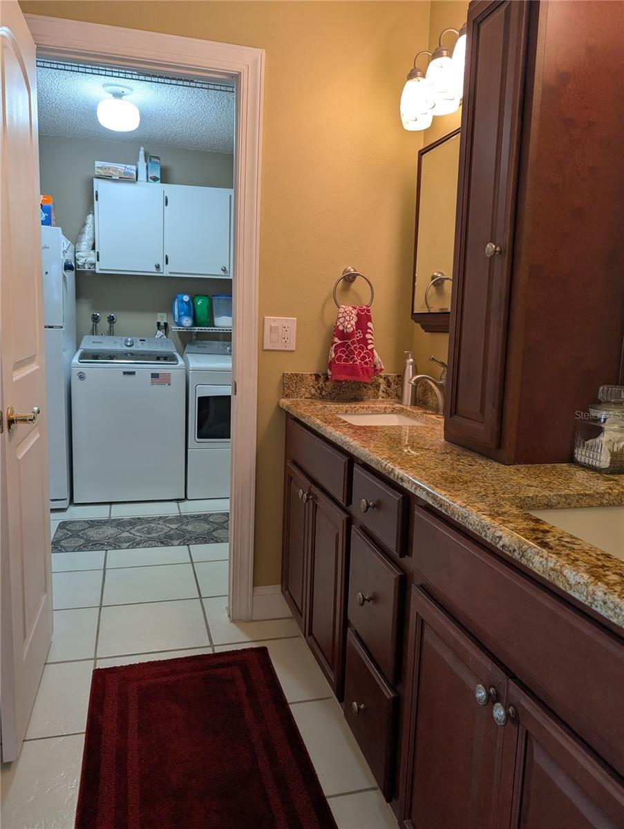 View from primary bath into laundry room.