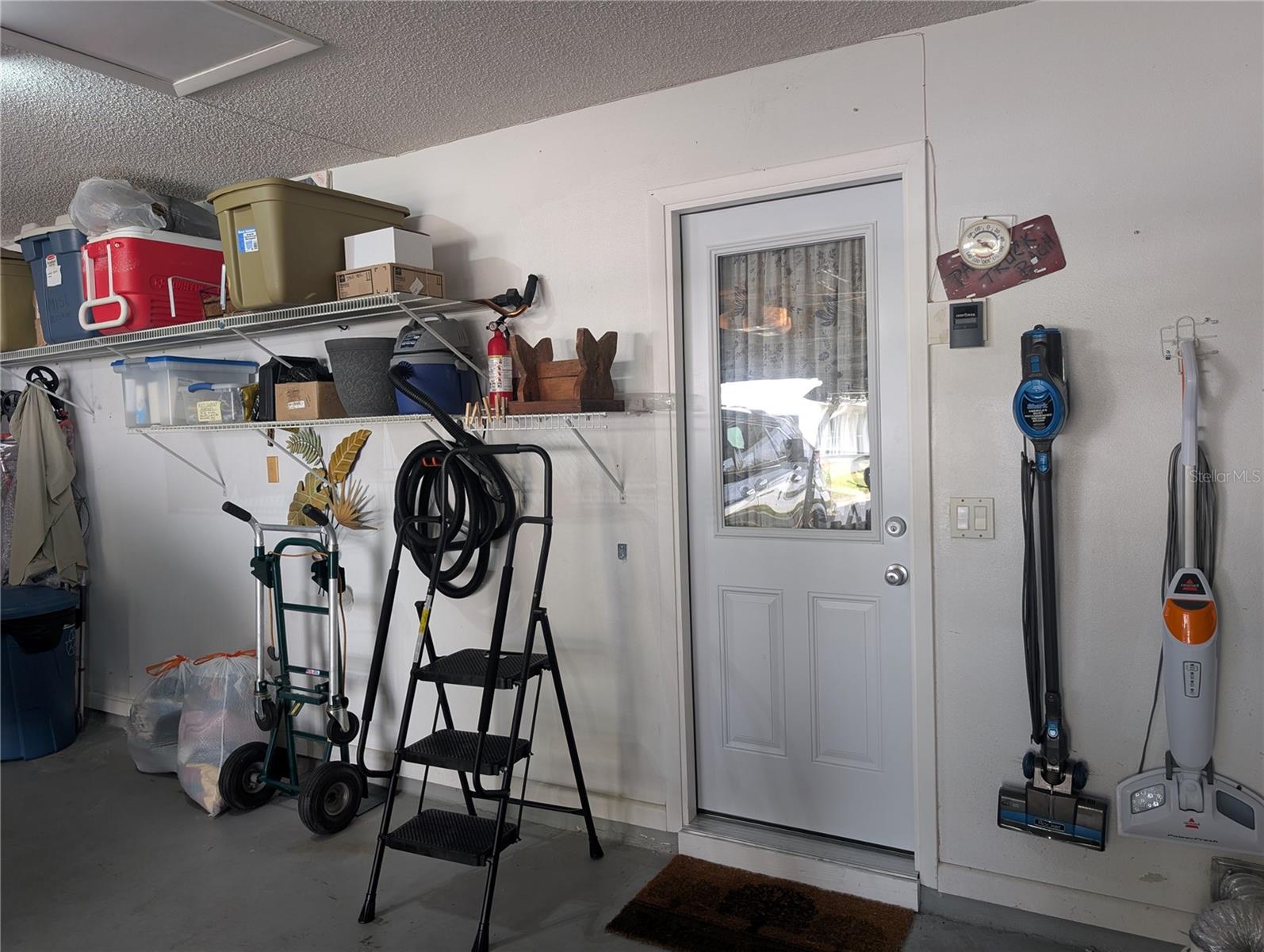 The oversized 2 car garage has direct access into the laundry room.