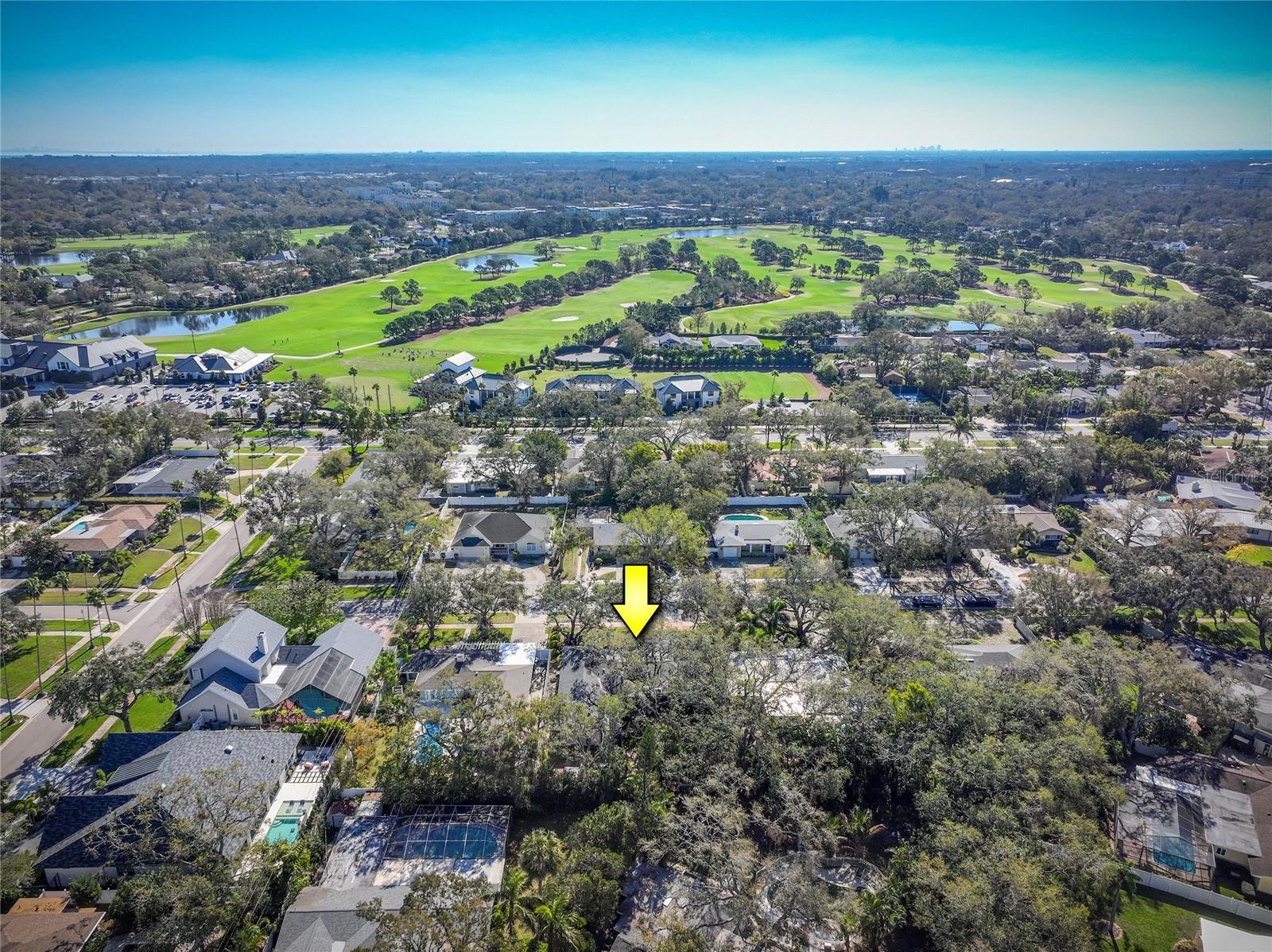 Ariel view of house with Pelican Golf Club in background