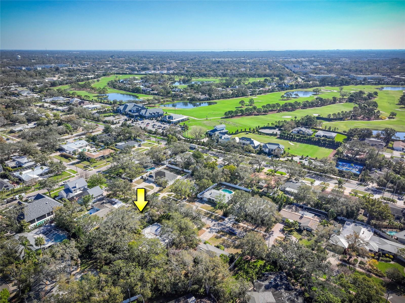 Ariel view of house with Pelican Golf Club in background