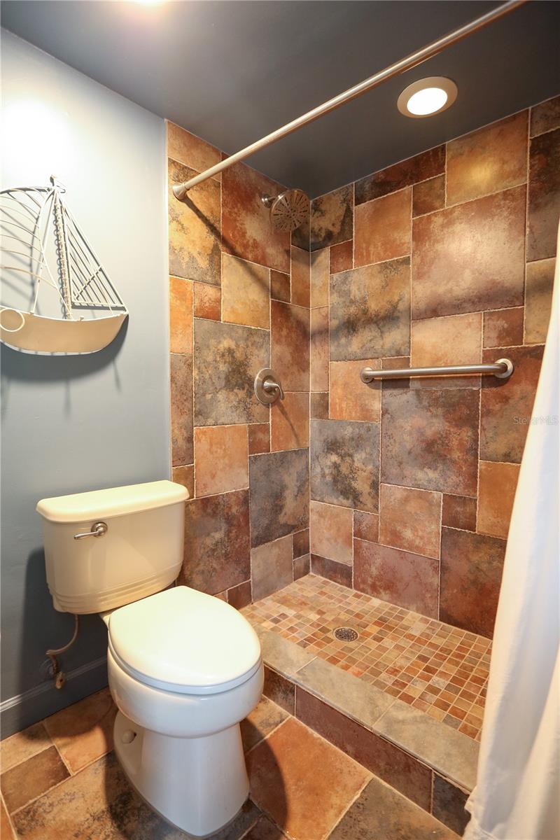 Private water closet and shower.