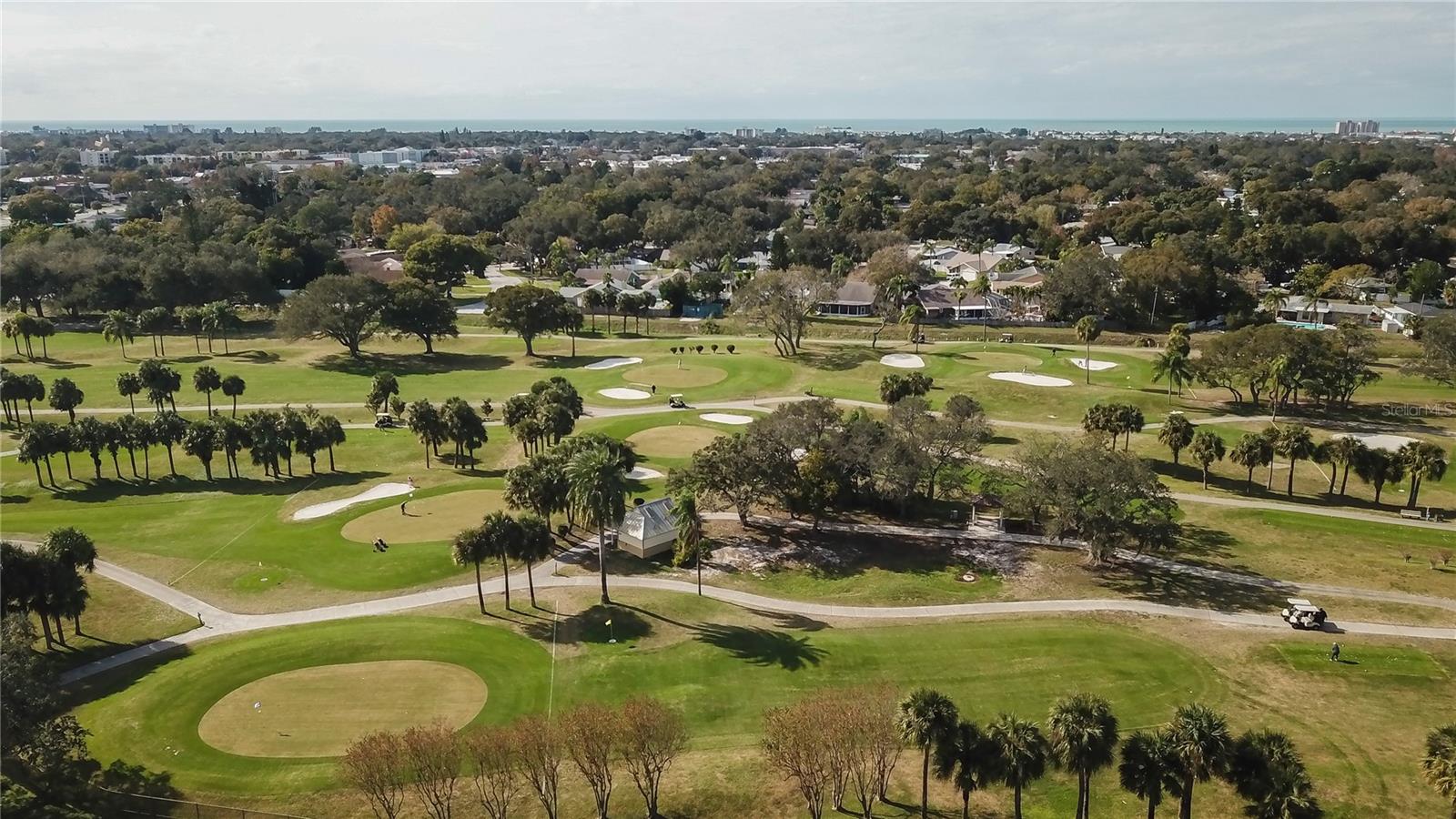 Aerial view of golf course and the Gulf of Mexico in the horrizon