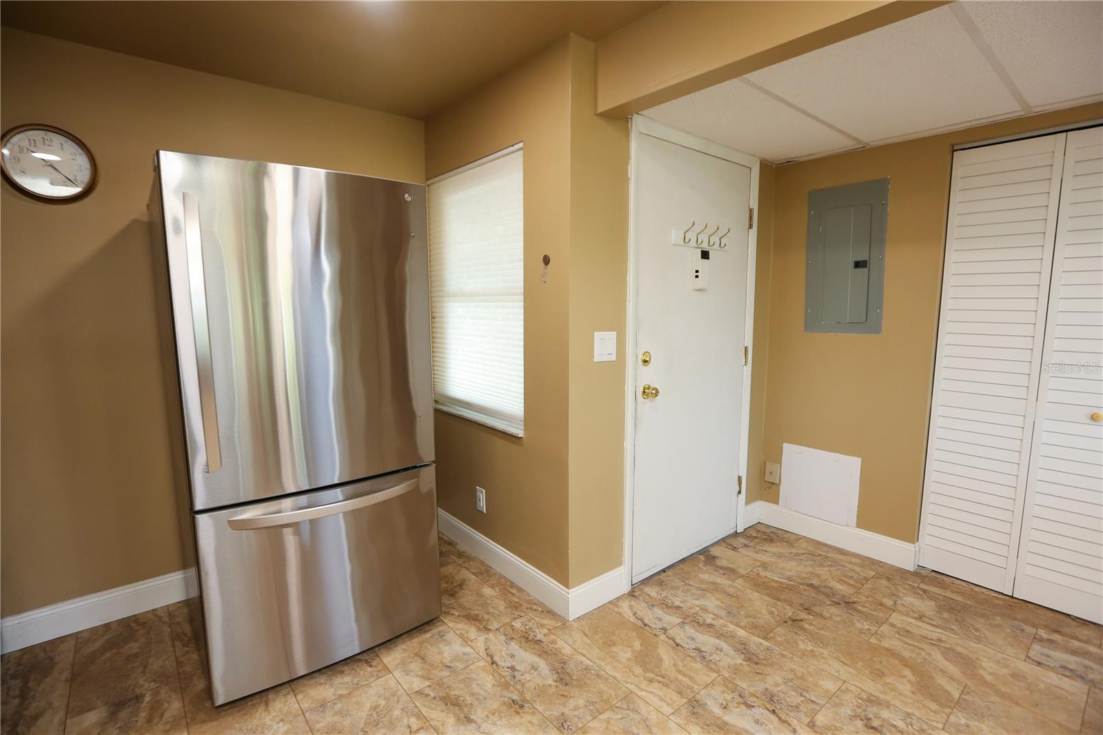 Entrance into the condo across from kitchen is a pantry.