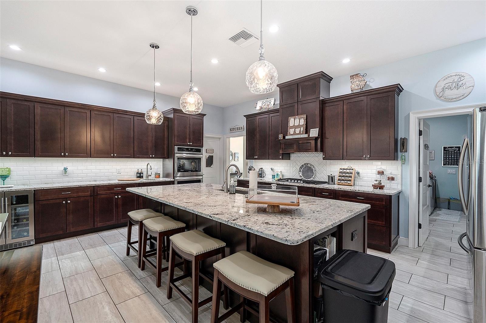 Kitchen with Bar area and Laundry Room