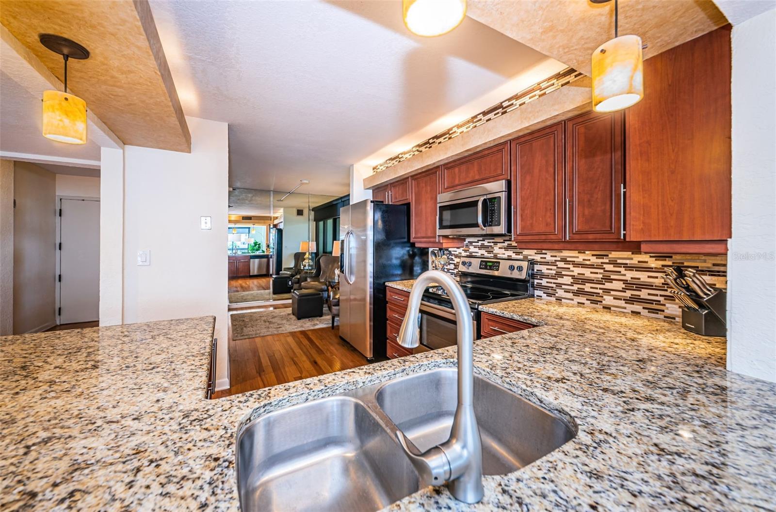 Granite counter tops provide a sleek look.