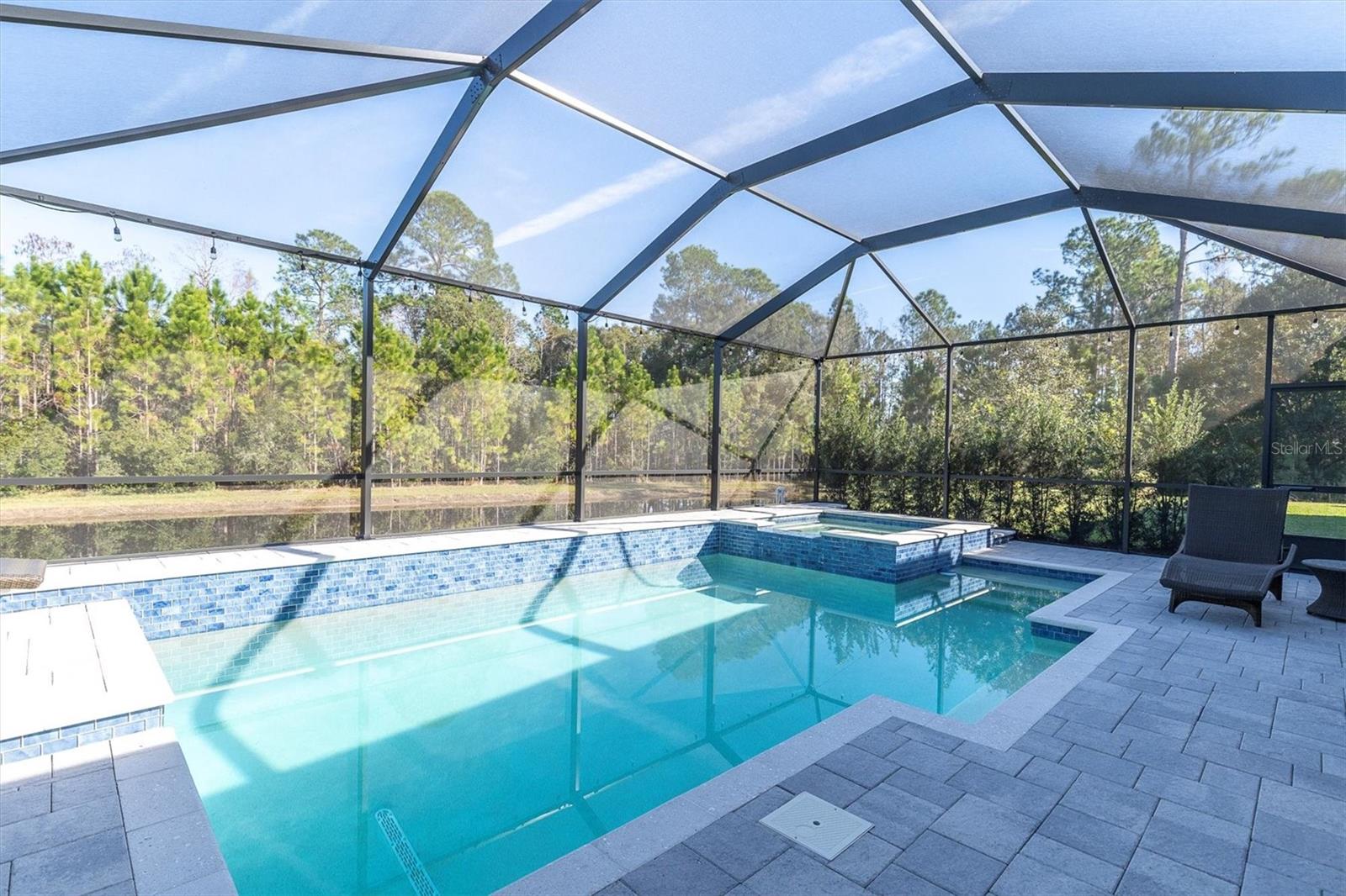 HEATED POOL & SPA WITH PRIVATE VIEW OF TREES AND POND