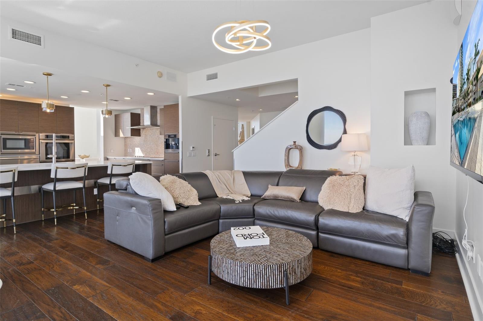 The family sitting area allows for easy entertaining and conversations while cooking.