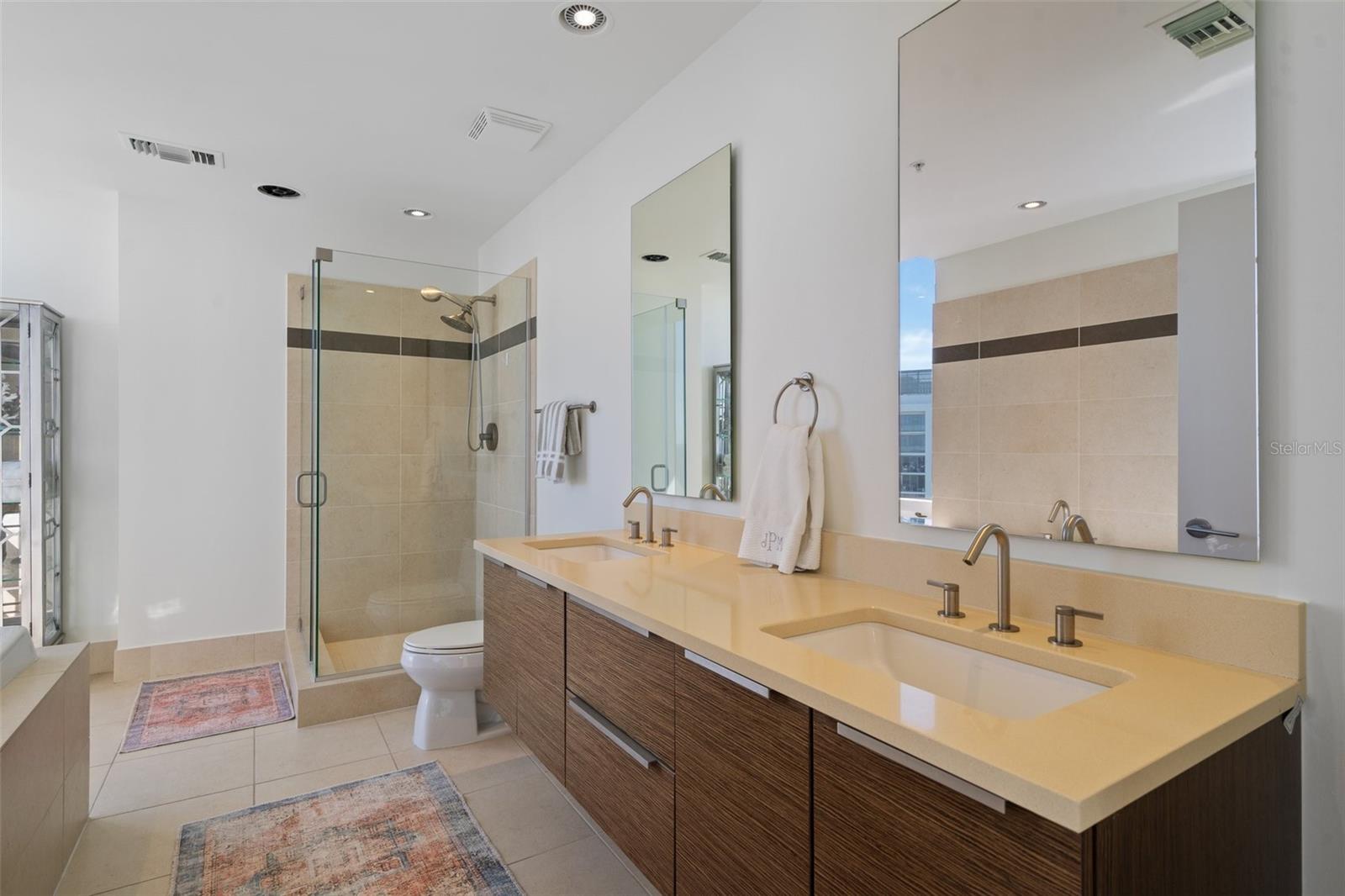 Double sink vanity in the guest bathroom ensuite on the third level.