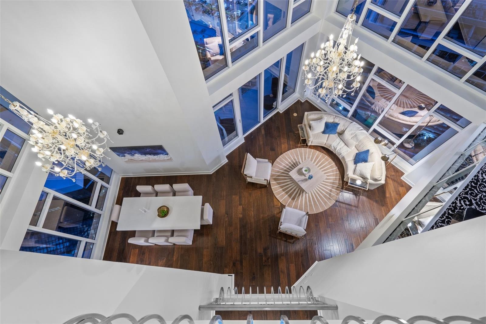 It's an architectural wonder. This is a picture from the third level, looking down. The penthouse has 30-foot ceilings.