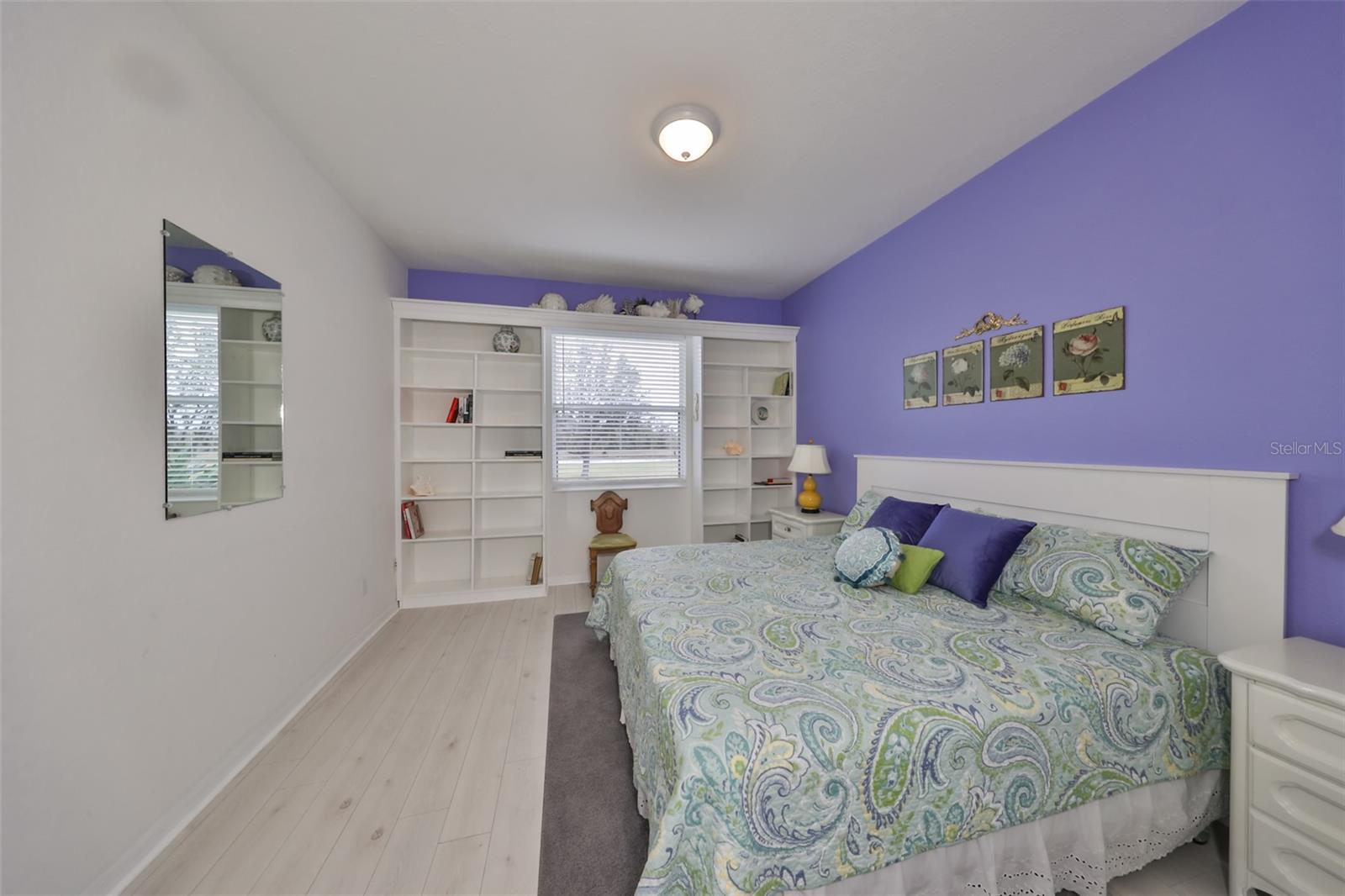 Primary Bedroom with Built in Shelving