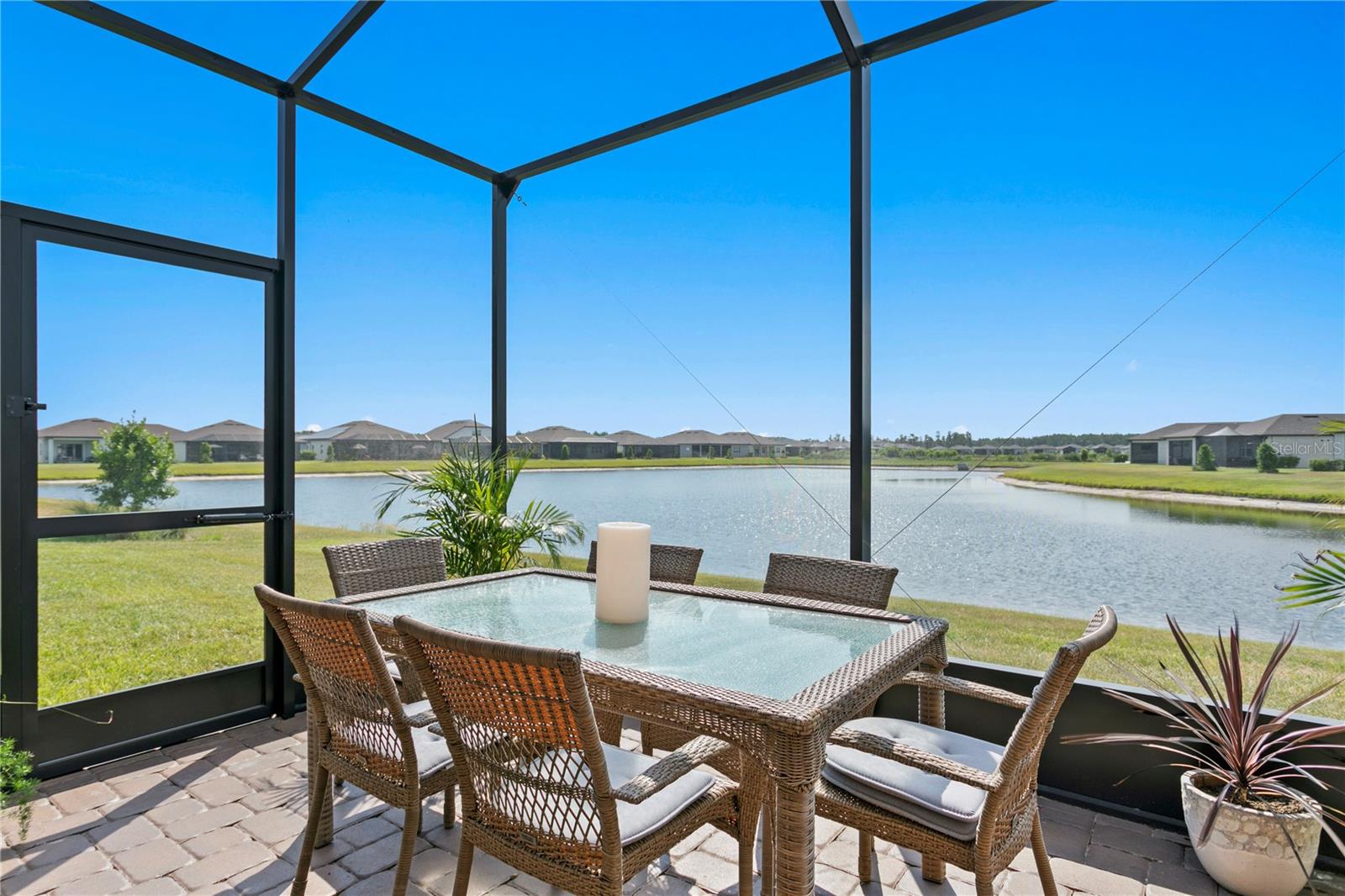 Birdcage lanai and pond view