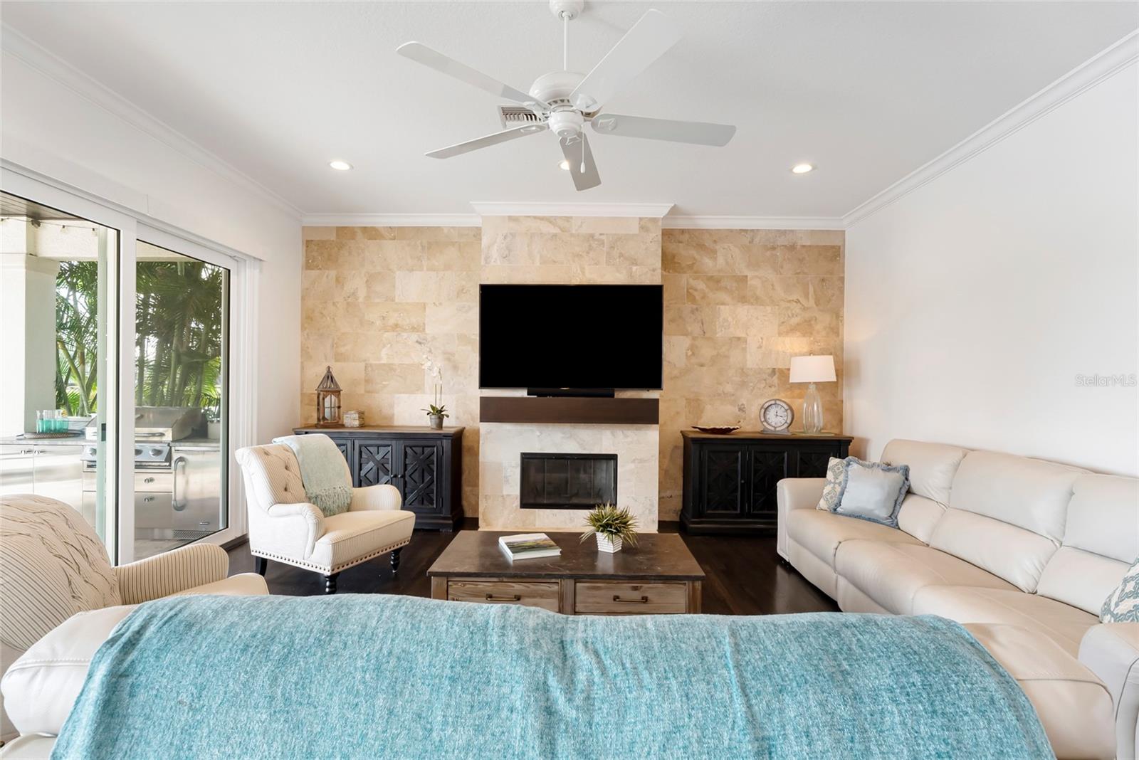 Family room with wood burning fireplace