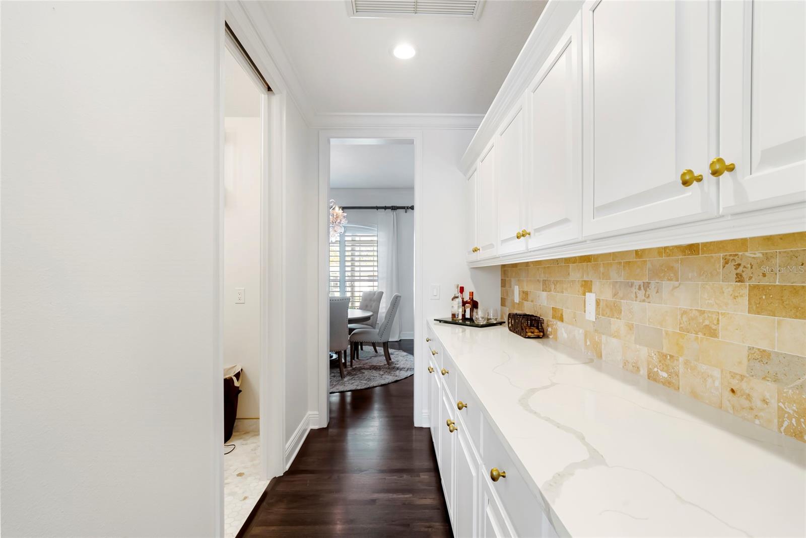 Butler's pantry connecting dining room to kitchen