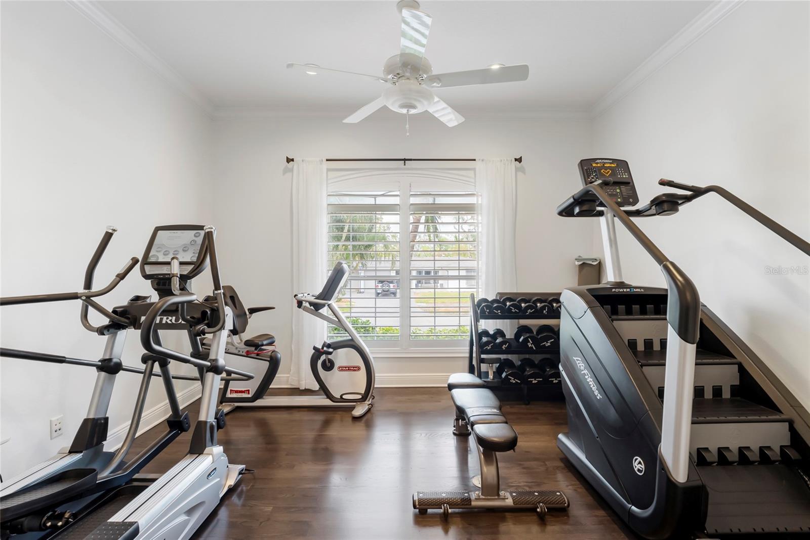 Perfect home office or gym! Pocket glass doors create a quiet escape to get your work or workout done!