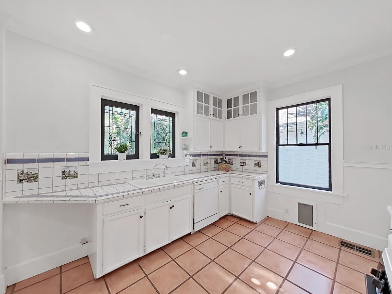 Look out through your stained glass windows above sink.