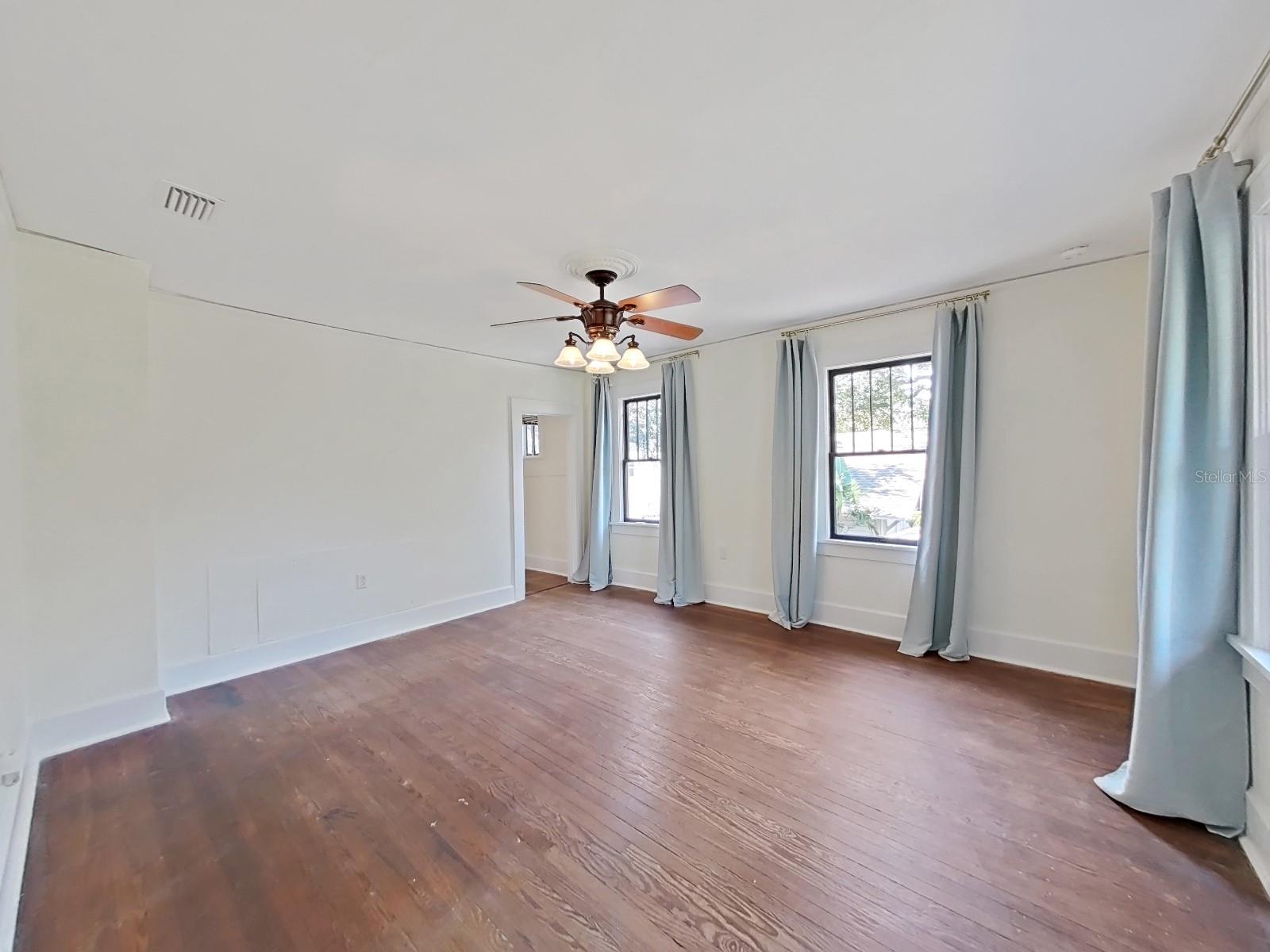 Primary bedroom.  Possible room enough to add another closet.