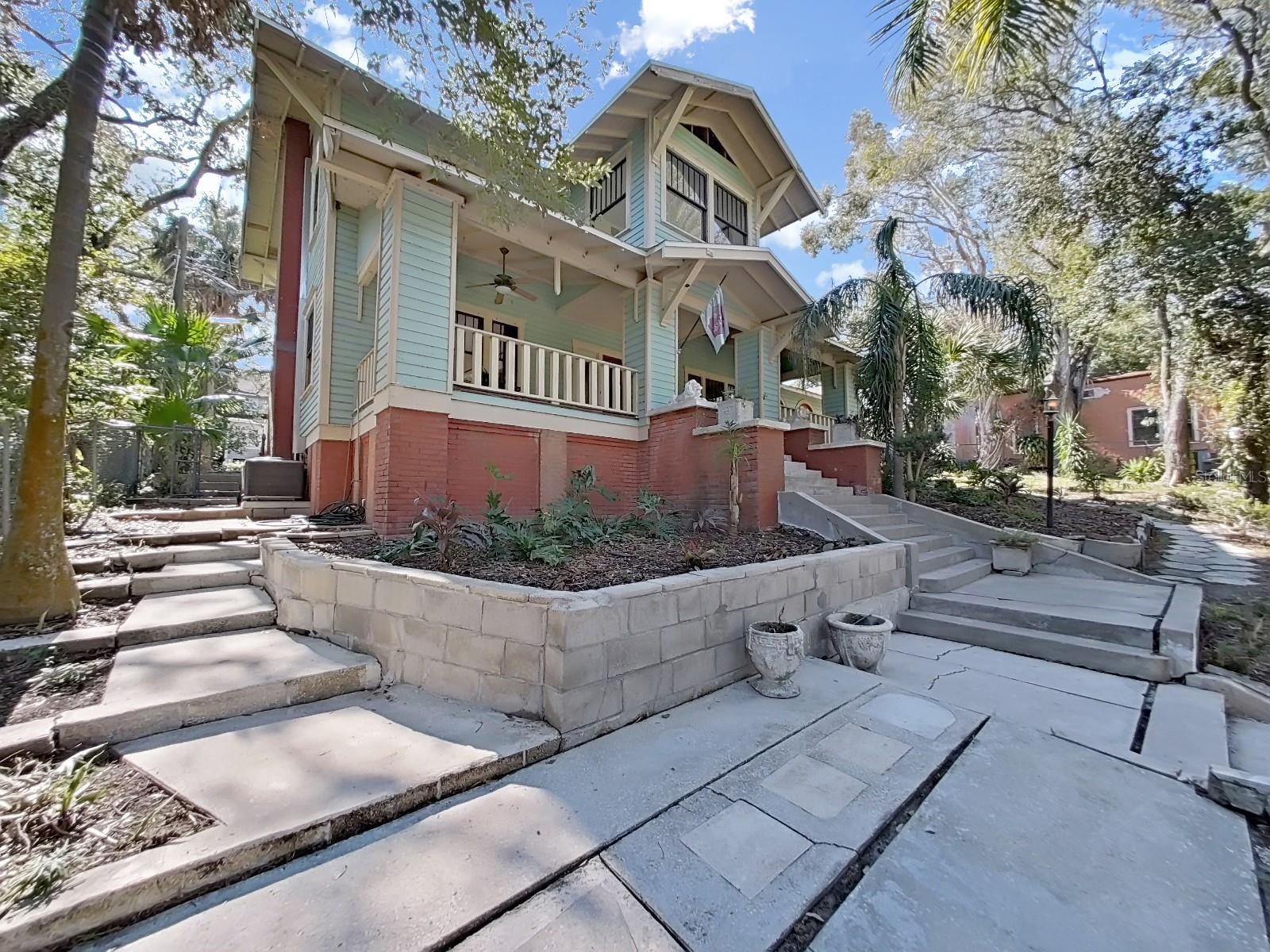 Beautifully terraced.  Landscaping could be spectacular. No damage except to landscaping from Hurricanes. Not in flood zone.