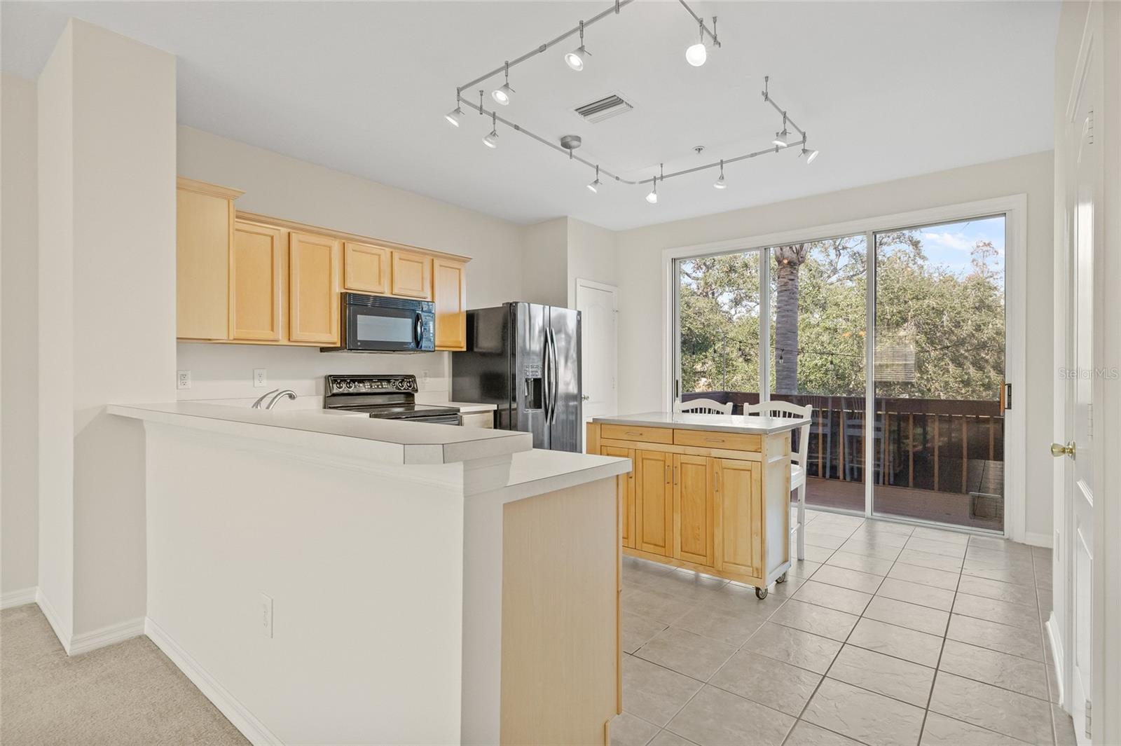 2nd level Kitchen with slider out to balcony!