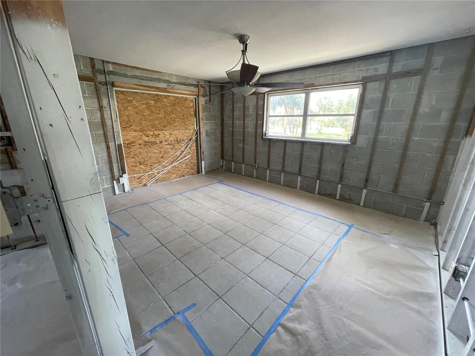 Primary bedroom with en-suite half bath