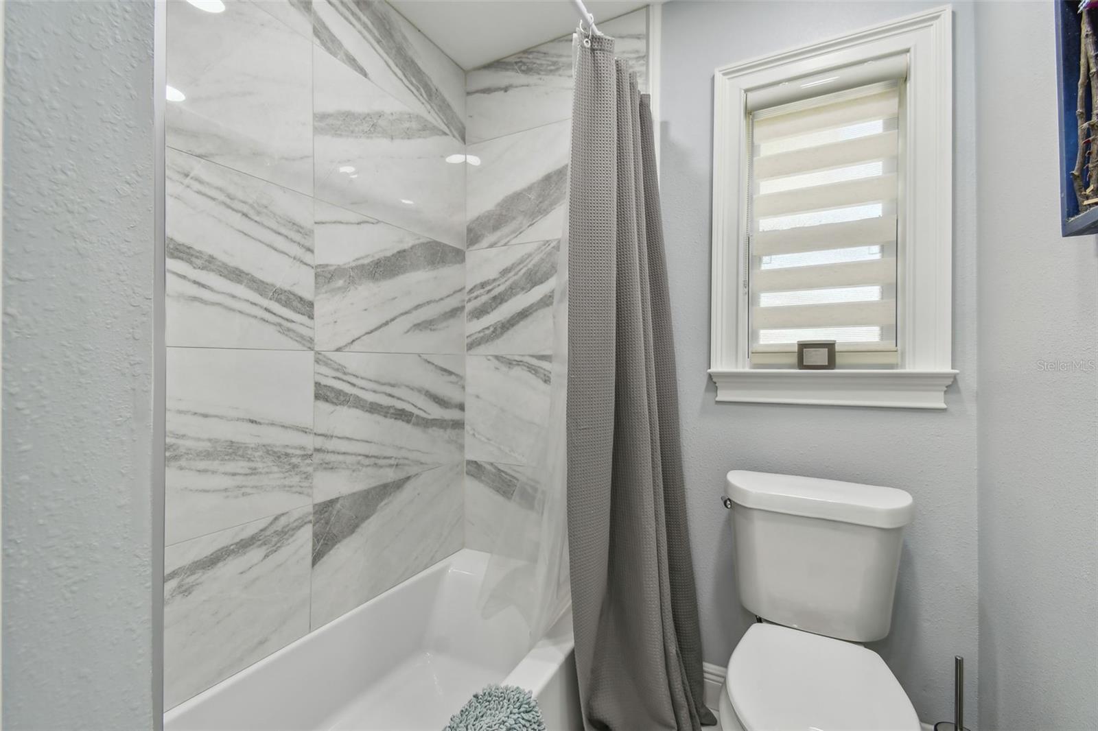 2nd Bathroom with tub and shower