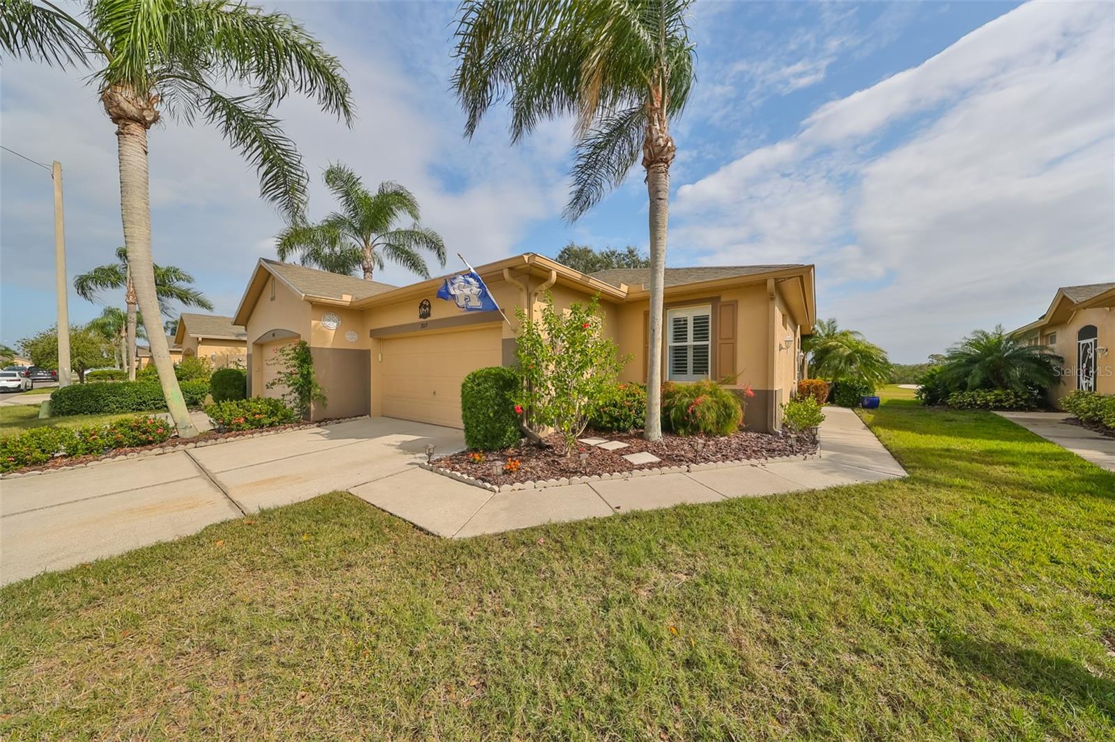 The palms sway and rustle in the wind as you enter your new alluring home, which has considerable space between the units.