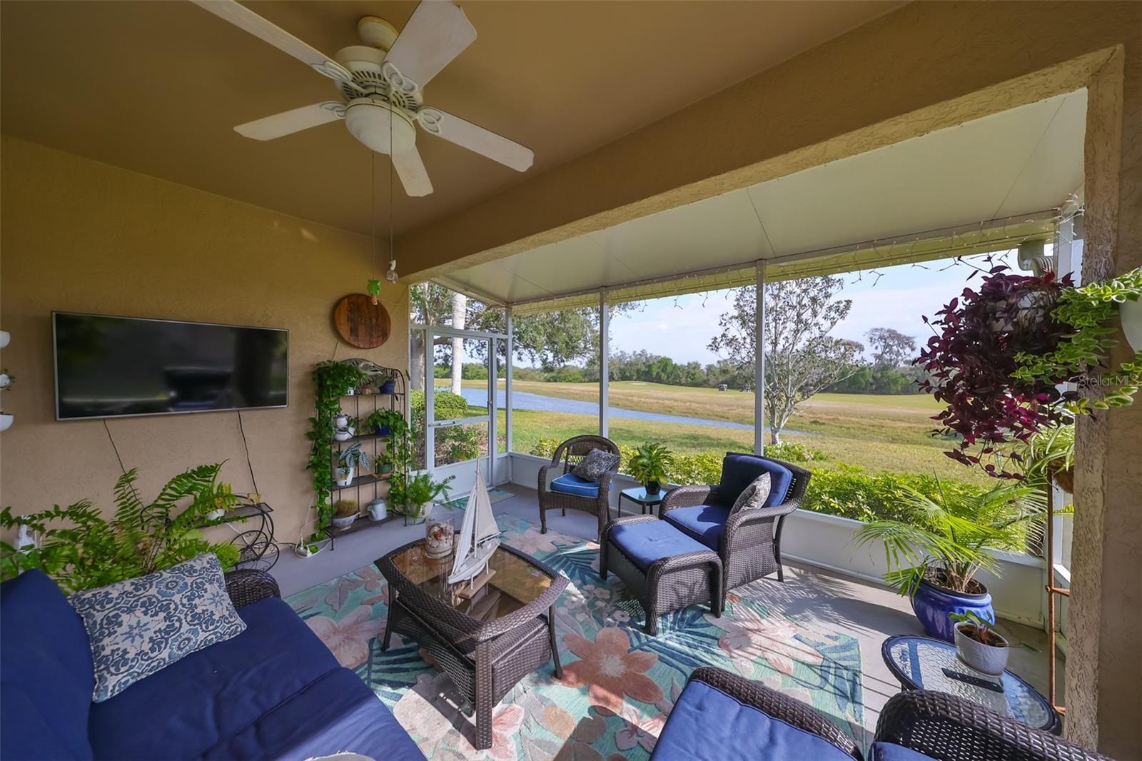 What an incredible view of the water, golf course and conservation area from your back screened in Lanai.  A perfect place to watch the sun rise, active wildlife and golfers going by.