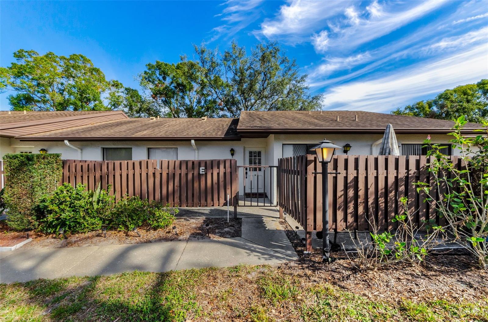 Front Entry with gate into open patio/porch