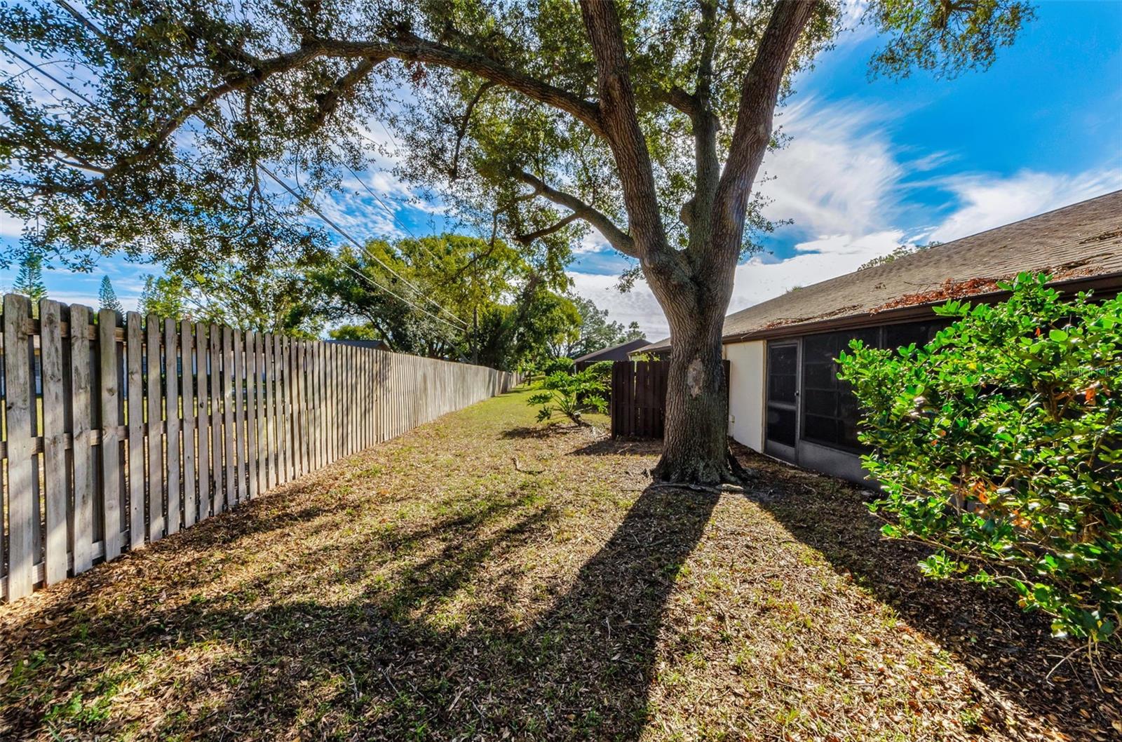 Rear view of unit and privacy fence