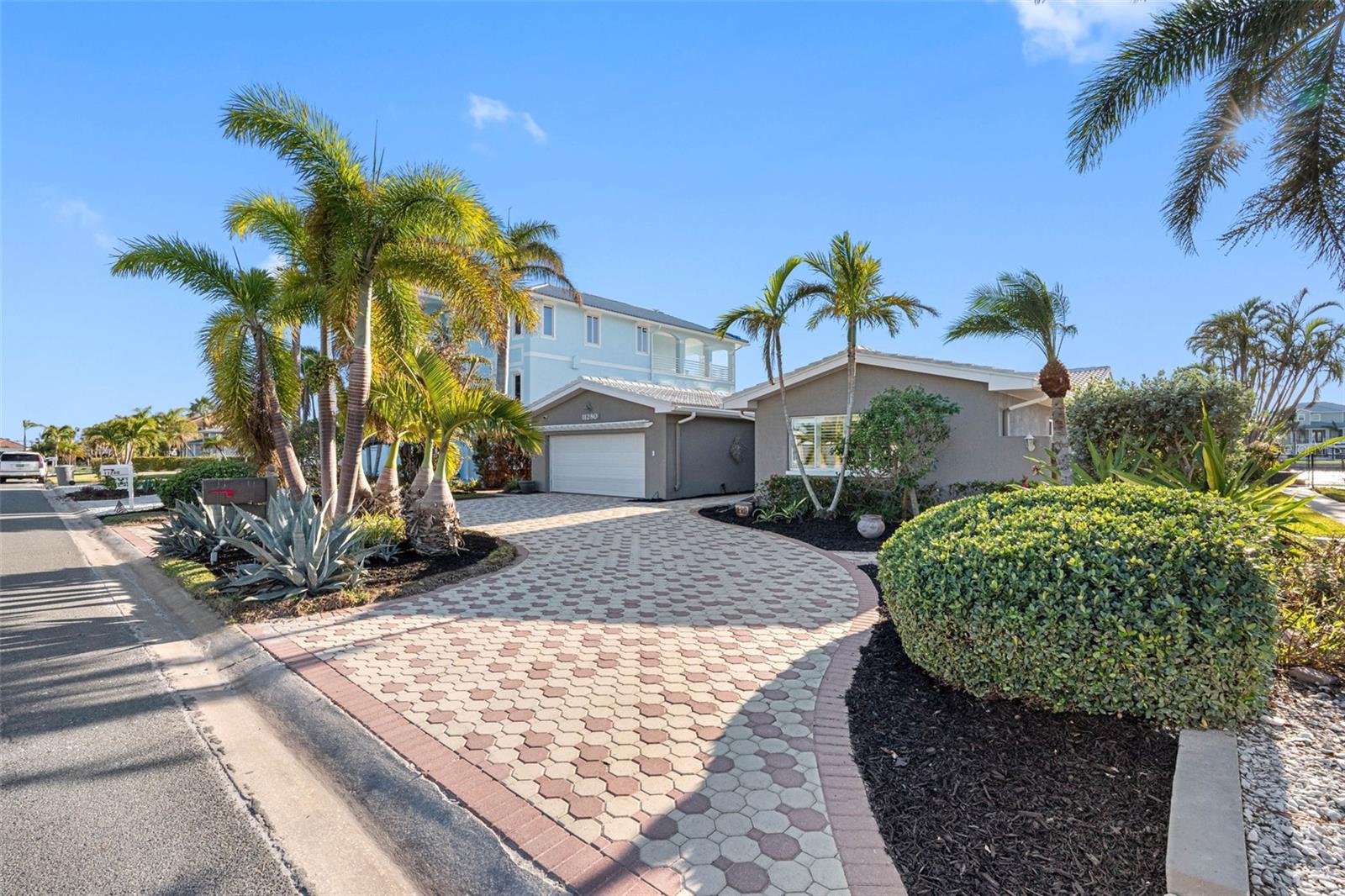 Large circular pavered driveway.