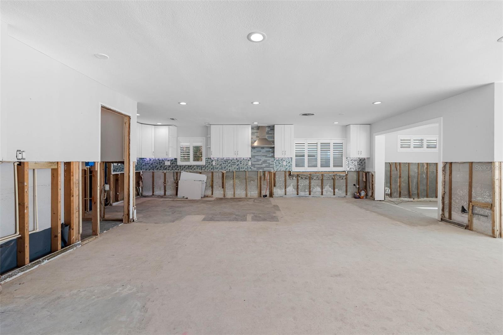 Enormous kitchen area is open to living and dining areas.