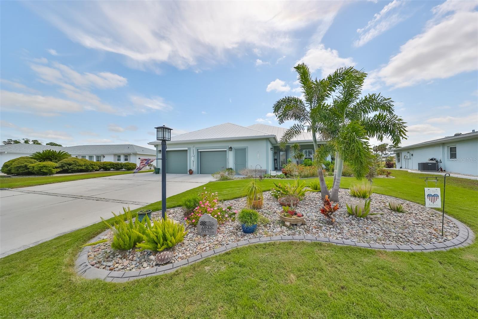 A newly re-sodded and landscaped front and back yard have been recently completed, inclusive with both Fruit and Palm trees added for a beautiful touch. Landscaping is complete with concrete curbing and an irrigation system.