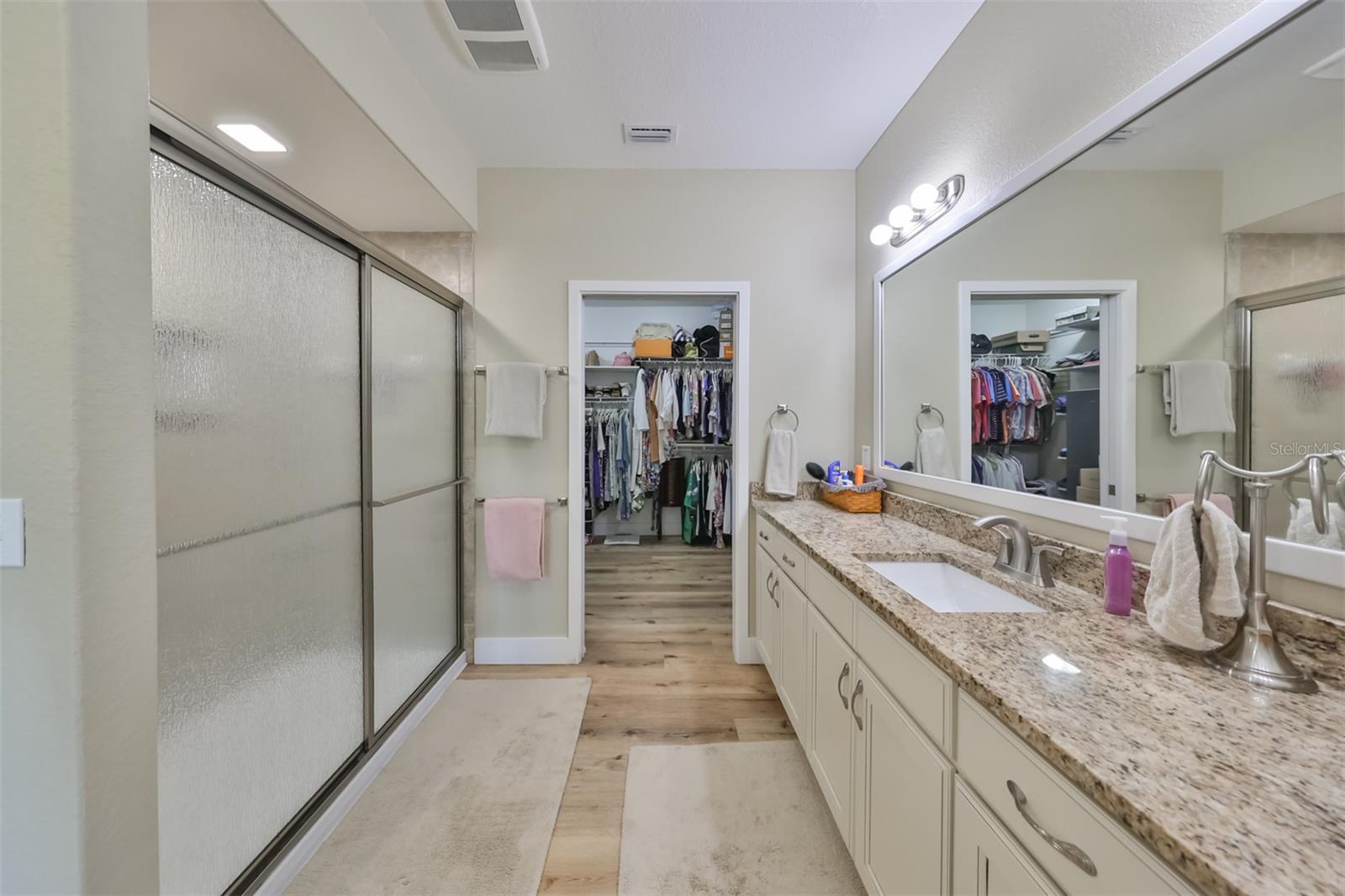 Another view of the large, upgraded walk-in shower with oversized walk-in closet.