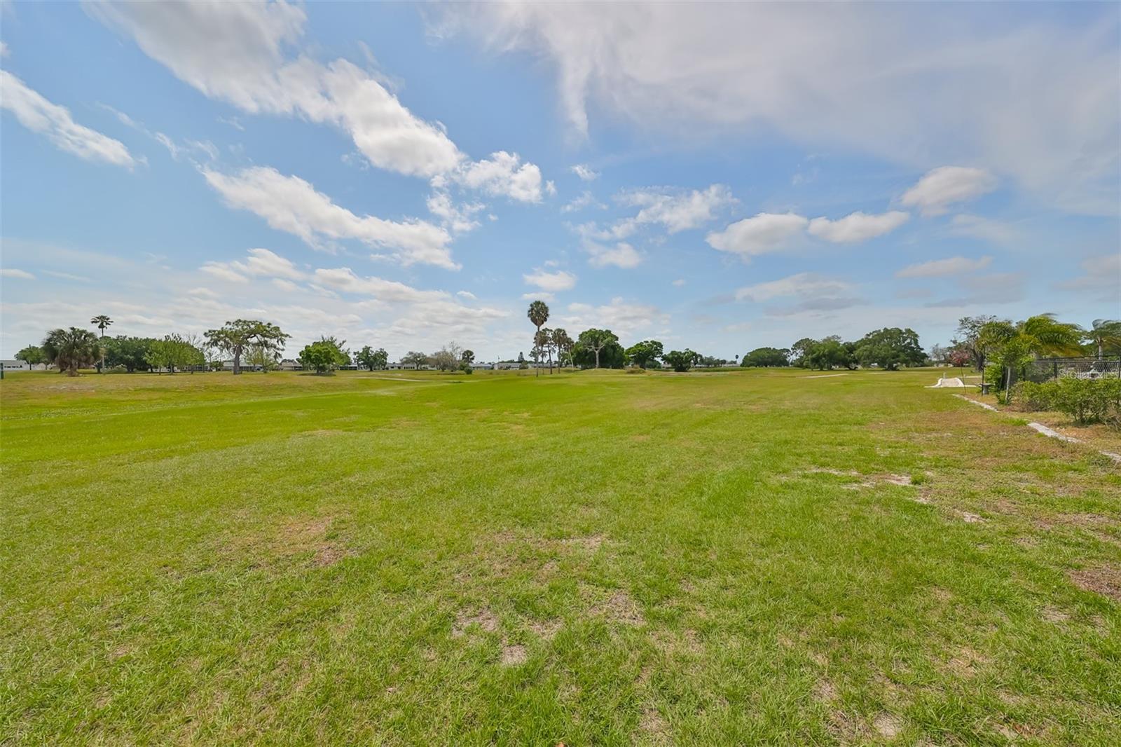 This backyard offers lots of privacy. It is directly backed up onto a retired golf course.