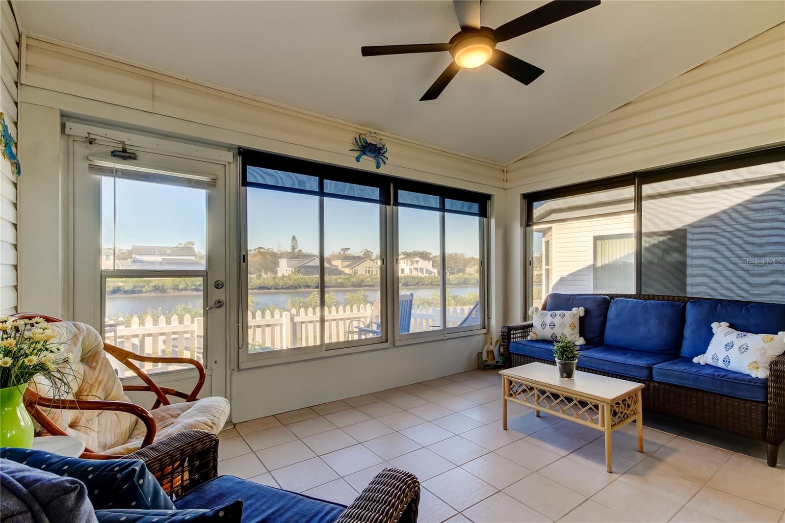 Enclosed porch overlooking canal