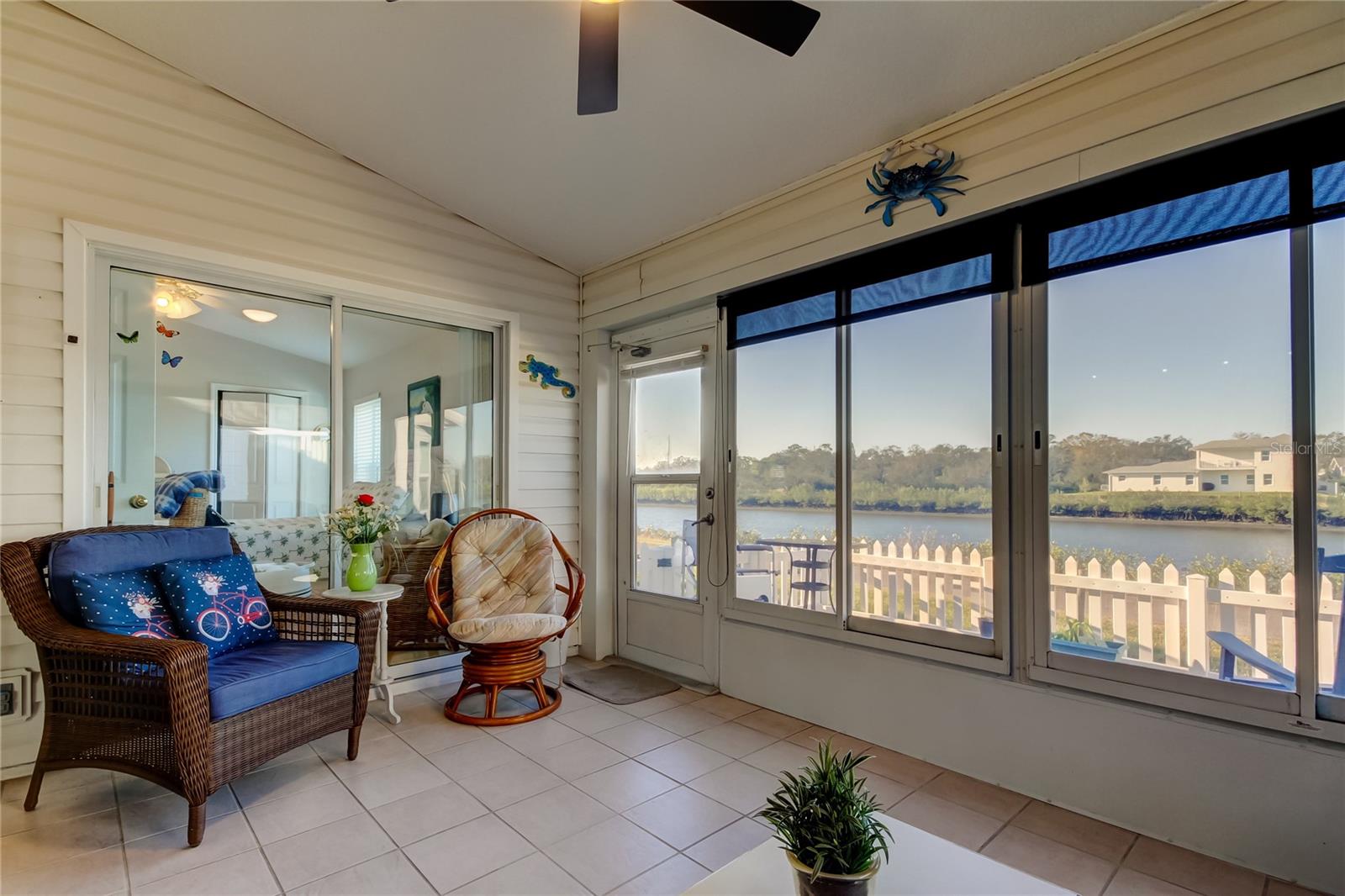 Enclosed porch overlooking canal