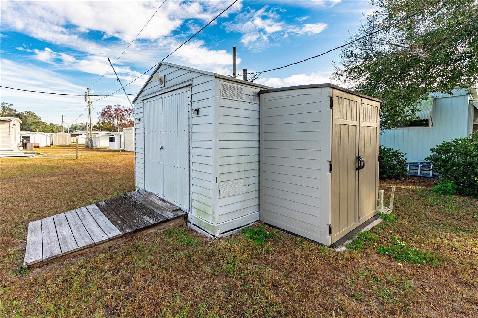 Exterior shed for storage for golf cart