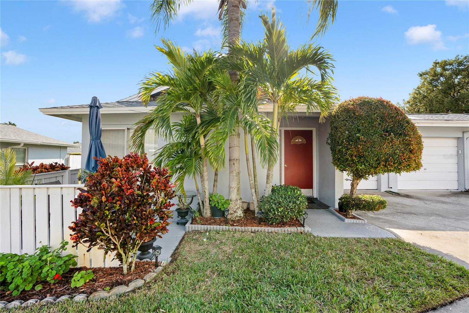 Front of Villa with 1 Car Garage & Patio