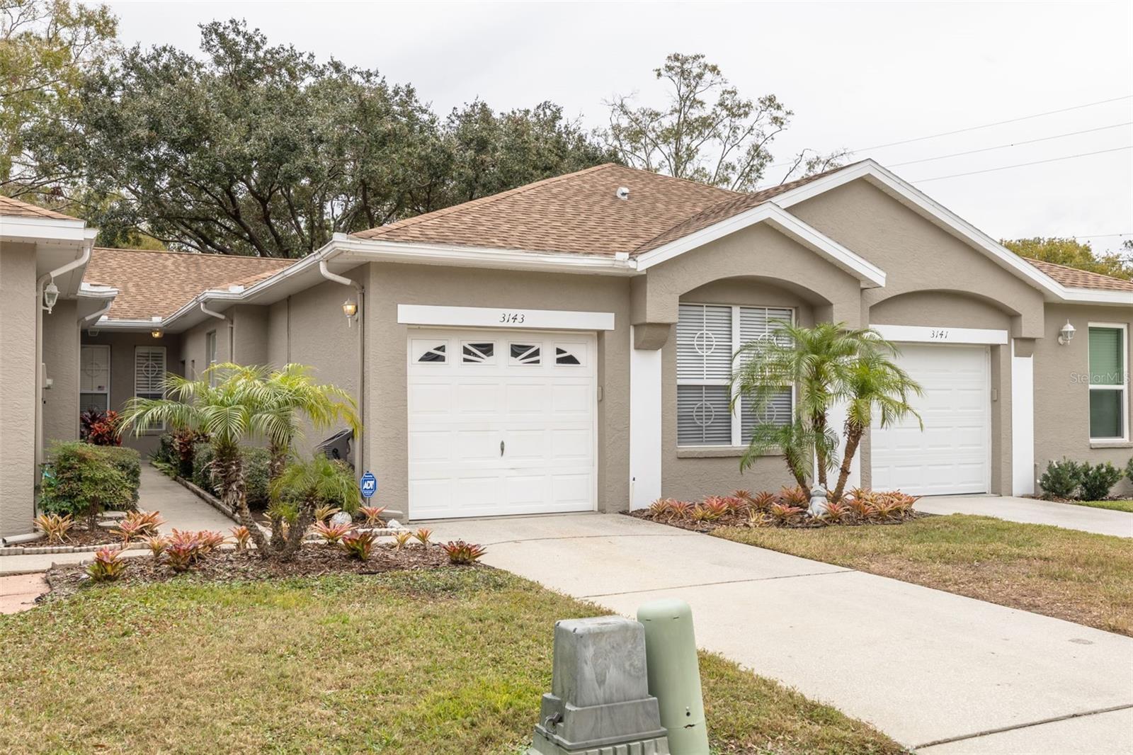 Garage, screened lanai and an office area in this 2/2 villa in East Lake!