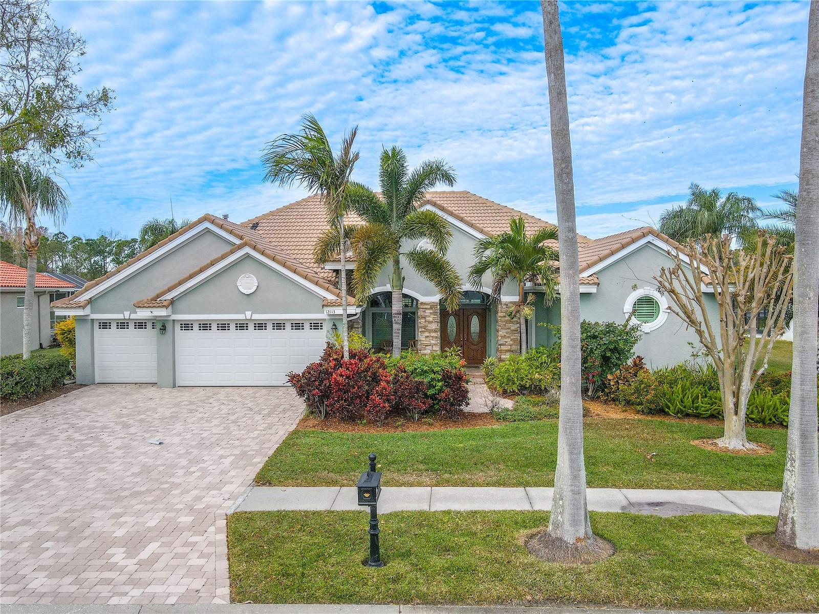 BEAUTIFULLY UPDATED 3400 square feet, 4 bedrooms, 3.5 baths, PLUS 400 sq ft Bonus Room, with 3-Garage Pool Home in the heart of Westchase.