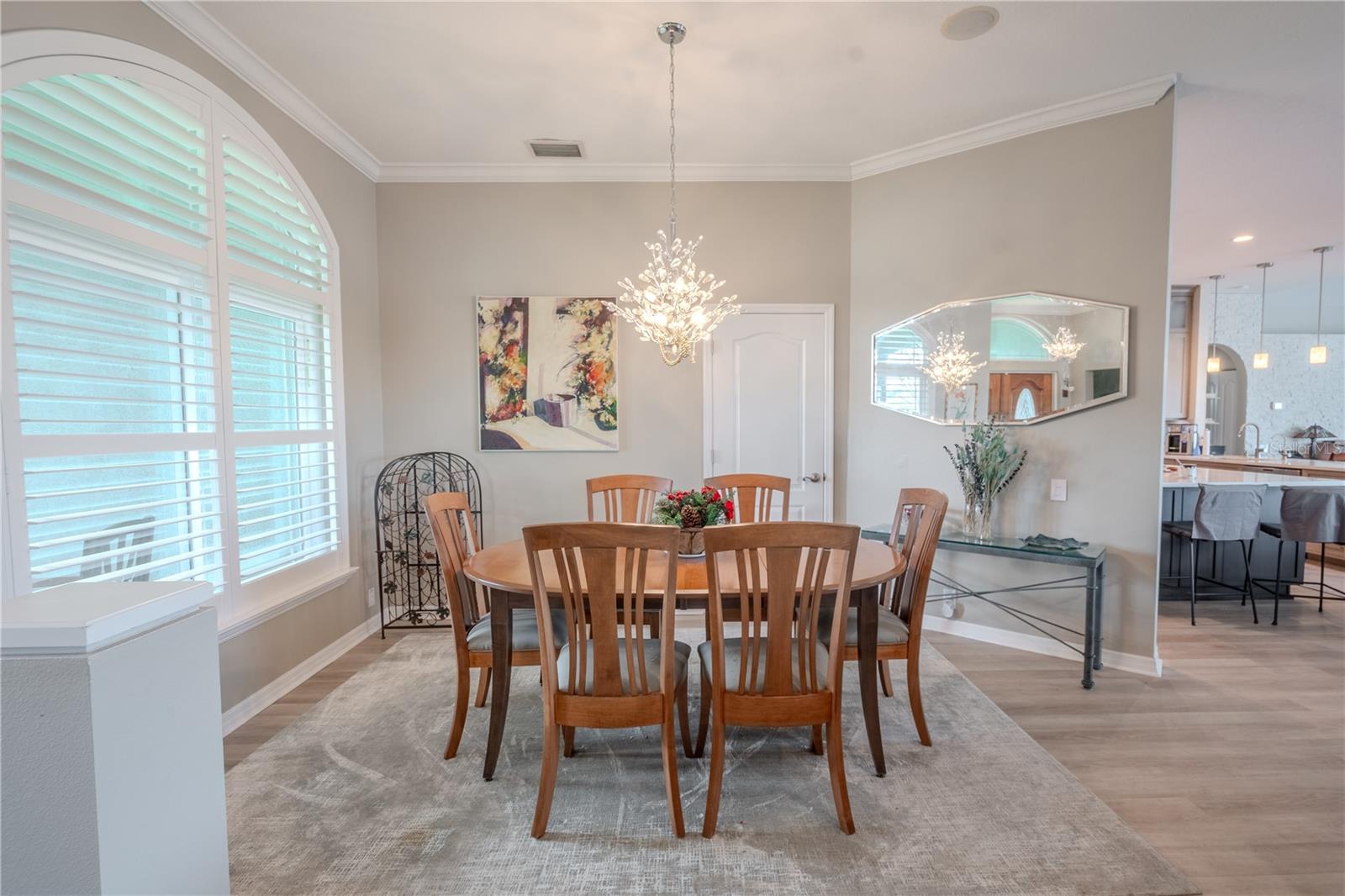 The dining room is adjacent to the living room and kitchen ideal for entertaining.